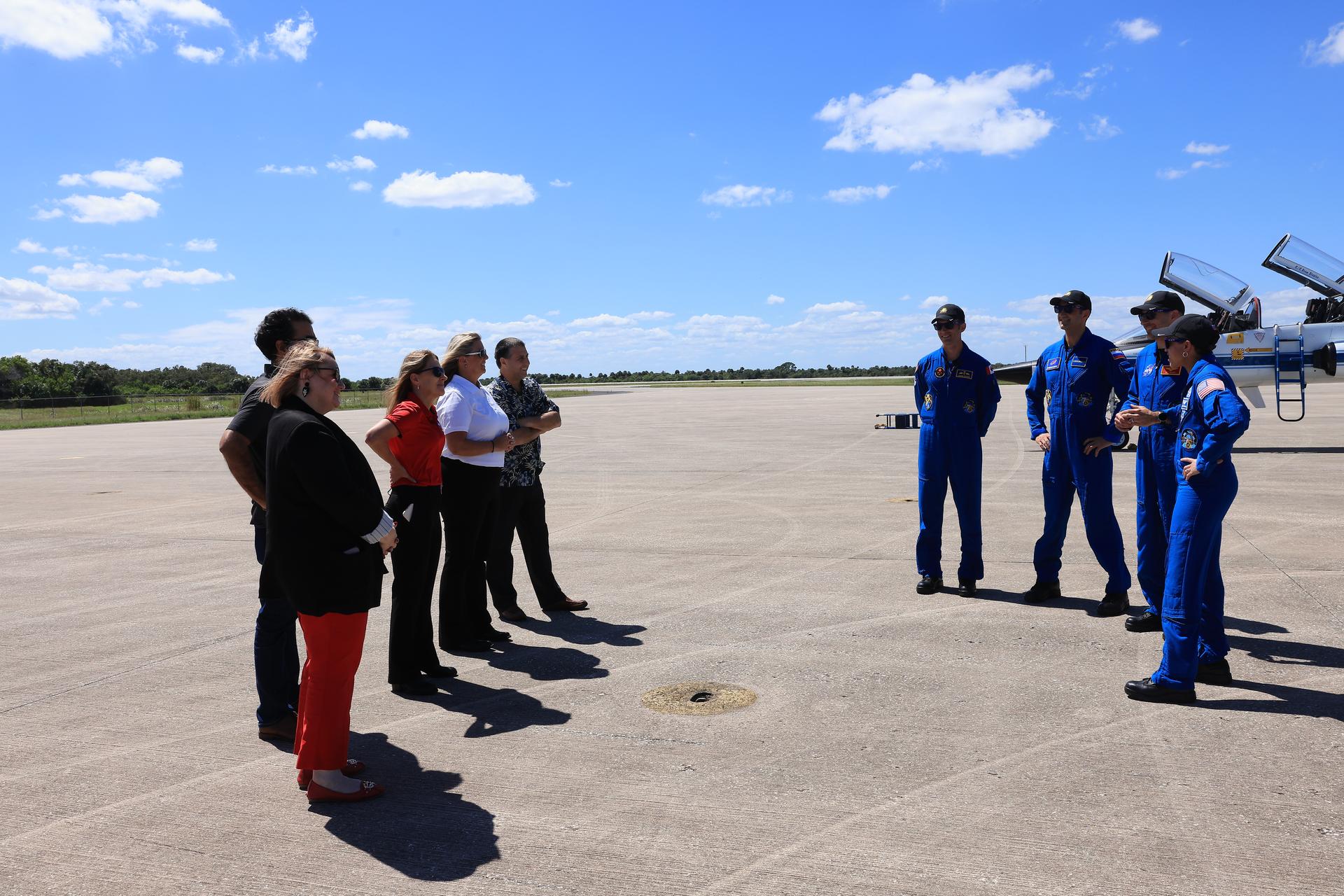Crew members of NASA’s SpaceX Crew-13 mission NASA astronauts Jessica Watkins and Luke Delaney, CSA (Canadian Space Agency) astronaut Joshua Kutryk, and Roscosmos cosmonaut Sergey Teteryatnikov arrive Saturday, Sept. 26, 2026, at the Shuttle Landing Facility at the agency’s Kennedy Space Center in Florida. The Crew-13 mission is slated to launch to the International Space Station aboard SpaceX’s Dragon spacecraft atop company’s Falcon 9 rocket from Cape Canaveral Space Force Station’s Space Launch Complex 40 at 11:10 a.m. EDT on Thursday, Oct. 1. 