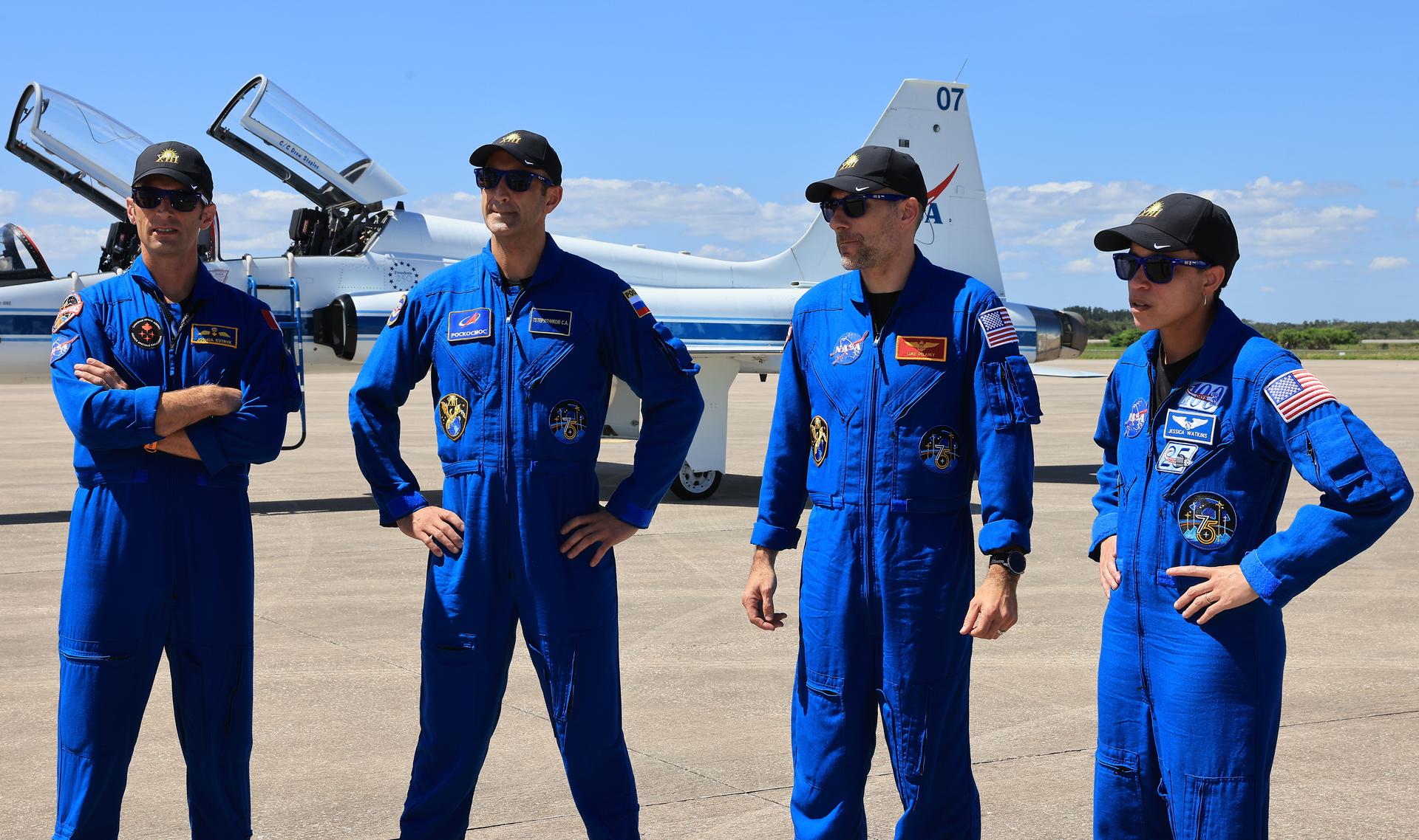 From left, crew members of NASA’s SpaceX Crew-13 mission, CSA (Canadian Space Agency) astronaut Joshua Kutryk, Roscosmos cosmonaut Sergey Teteryatnikov, and NASA astronauts Luke Delaney and Jessica Watkins arrive Saturday, Sept. 26, 2026, at the Shuttle Landing Facility at the agency’s Kennedy Space Center in Florida. The Crew-13 mission is slated to launch to the International Space Station aboard SpaceX’s Dragon spacecraft atop company’s Falcon 9 rocket from Cape Canaveral Space Force Station’s Space Launch Complex 40 at 11:10 a.m. EDT on Thursday, Oct. 1. 