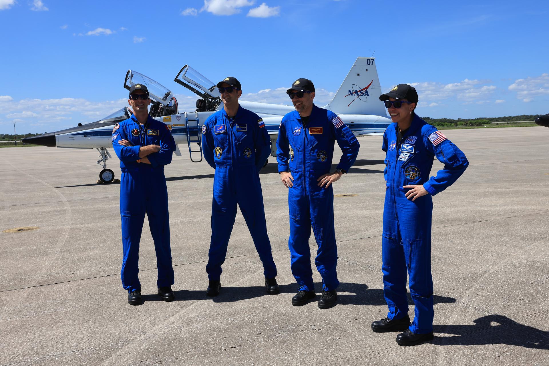 From left, crew members of NASA’s SpaceX Crew-13 mission, CSA (Canadian Space Agency) astronaut Joshua Kutryk, Roscosmos cosmonaut Sergey Teteryatnikov, and NASA astronauts Luke Delaney and Jessica Watkins arrive Saturday, Sept. 26, 2026, at the Shuttle Landing Facility at the agency’s Kennedy Space Center in Florida. The Crew-13 mission is slated to launch to the International Space Station aboard SpaceX’s Dragon spacecraft atop company’s Falcon 9 rocket from Cape Canaveral Space Force Station’s Space Launch Complex 40 at 11:10 a.m. EDT on Thursday, Oct. 1. 