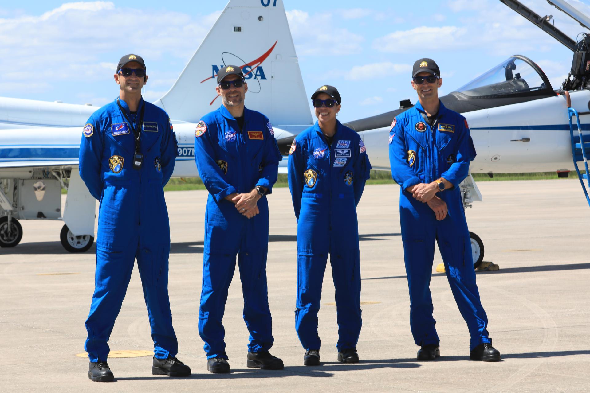 From left, crew members of NASA’s SpaceX Crew-13 mission, Roscosmos cosmonaut Sergey Teteryatnikov, NASA astronauts Luke Delaney and Jessica Watkins, and CSA (Canadian Space Agency) astronaut Joshua Kutryk arrive Saturday, Sept. 26, 2026, at the Shuttle Landing Facility at the agency’s Kennedy Space Center in Florida. The Crew-13 mission is slated to launch to the International Space Station aboard SpaceX’s Dragon spacecraft atop company’s Falcon 9 rocket from Cape Canaveral Space Force Station’s Space Launch Complex 40 at 11:10 a.m. EDT on Thursday, Oct. 1. 
