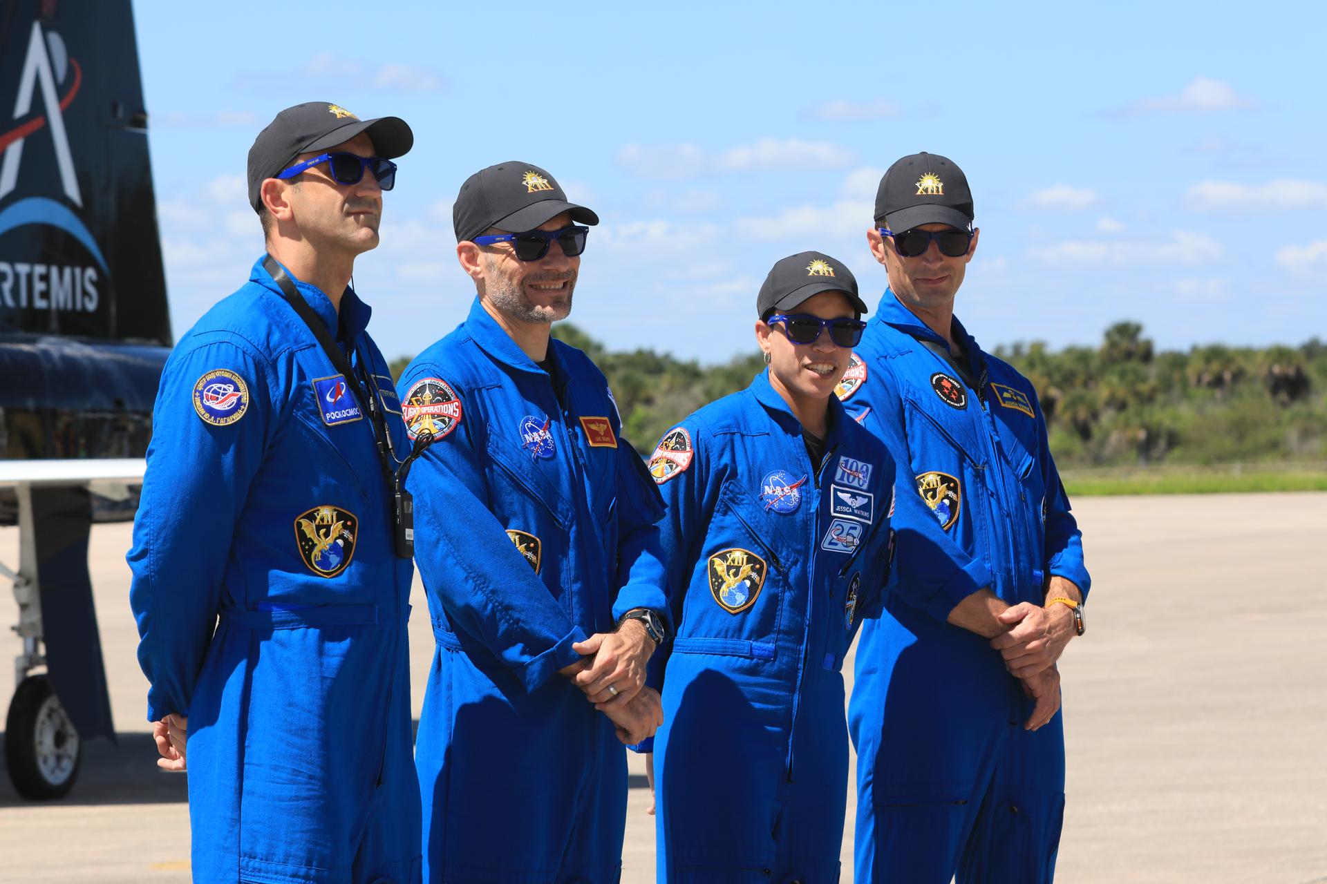 From left, crew members of NASA’s SpaceX Crew-13 mission, Roscosmos cosmonaut Sergey Teteryatnikov, NASA astronauts Luke Delaney and Jessica Watkins, and CSA (Canadian Space Agency) astronaut Joshua Kutryk arrive Saturday, Sept. 26, 2026, at the Shuttle Landing Facility at the agency’s Kennedy Space Center in Florida. The Crew-13 mission is slated to launch to the International Space Station aboard SpaceX’s Dragon spacecraft atop company’s Falcon 9 rocket from Cape Canaveral Space Force Station’s Space Launch Complex 40 at 11:10 a.m. EDT on Thursday, Oct. 1. 