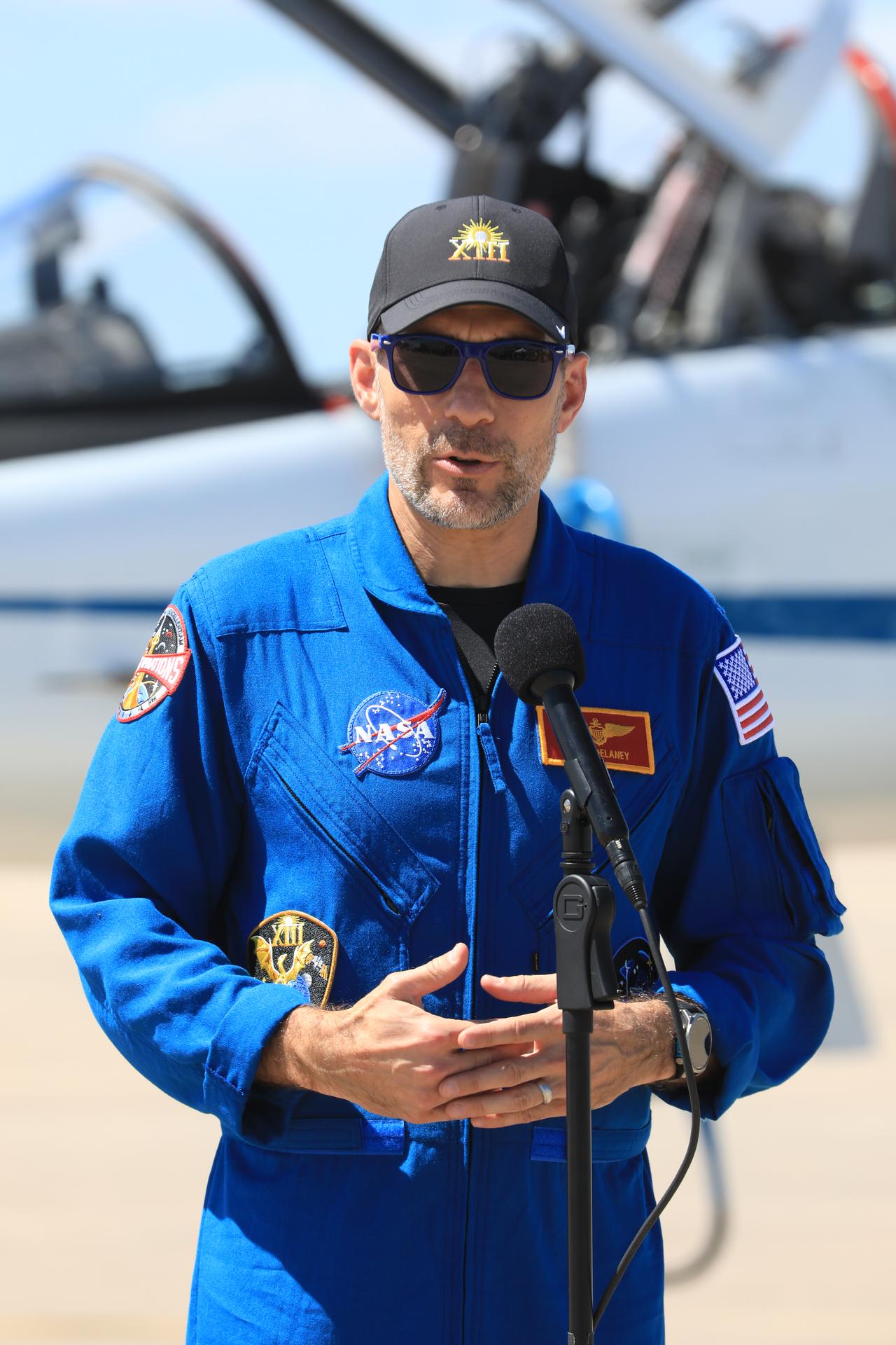 NASA astronaut Luke Delaney, pilot, speaks to the news media during crew arrival for NASA’s SpaceX Crew-13 mission at the Shuttle Landing Facility at the agency’s Kennedy Space Center in Florida on Saturday, Sept. 26, 2026. Delaney and fellow NASA astronaut Jessica Watkins, along with CSA (Canadian Space Agency) astronaut Joshua Kutryk, and Roscosmos cosmonaut Sergey Teteryatnikov will launch to the International Space Station aboard SpaceX’s Dragon spacecraft and Falcon 9 rocket at 11:10 a.m. EDT on Thursday, Oct. 1, from Cape Canaveral Space Force Station’s Space Launch Complex 40.  
