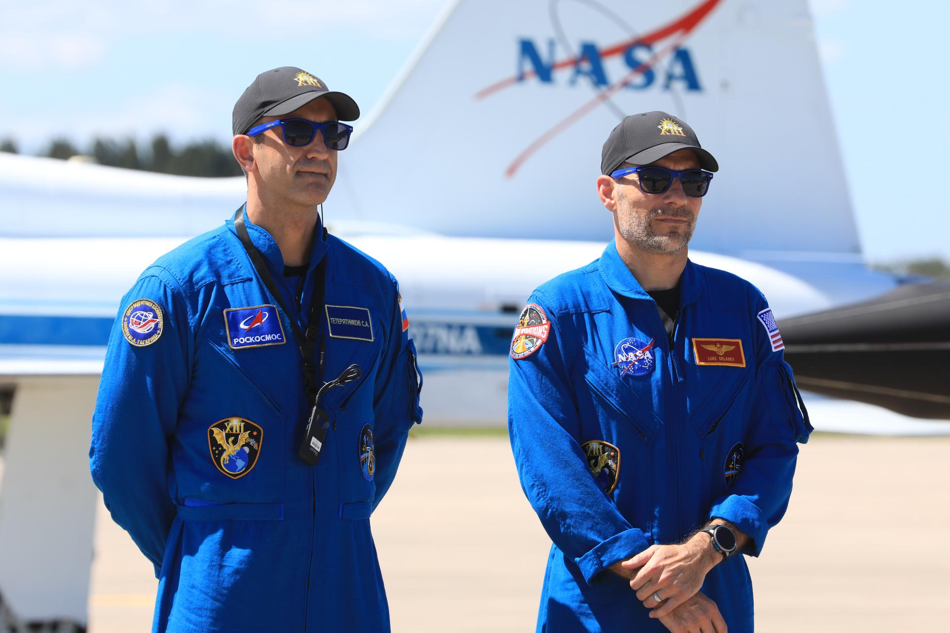 From left, Roscosmos cosmonaut mission specialist Sergey Teteryatnikov and NASA astronaut Luke Delaney participate in a news media event during crew arrival for NASA’s SpaceX Crew-13 mission at the Shuttle Landing Facility at the agency’s Kennedy Space Center in Florida on Saturday, Sept. 26, 2026. NASA astronauts Jessica Watkins and Delaney, along with CSA (Canadian Space Agency) astronaut Joshua Kutryk and Teteryatnikov will launch to the International Space Station aboard SpaceX’s Dragon spacecraft and Falcon 9 rocket at 11:10 a.m. EDT on Thursday, Oct. 1, from Cape Canaveral Space Force Station’s Space Launch Complex 40.  