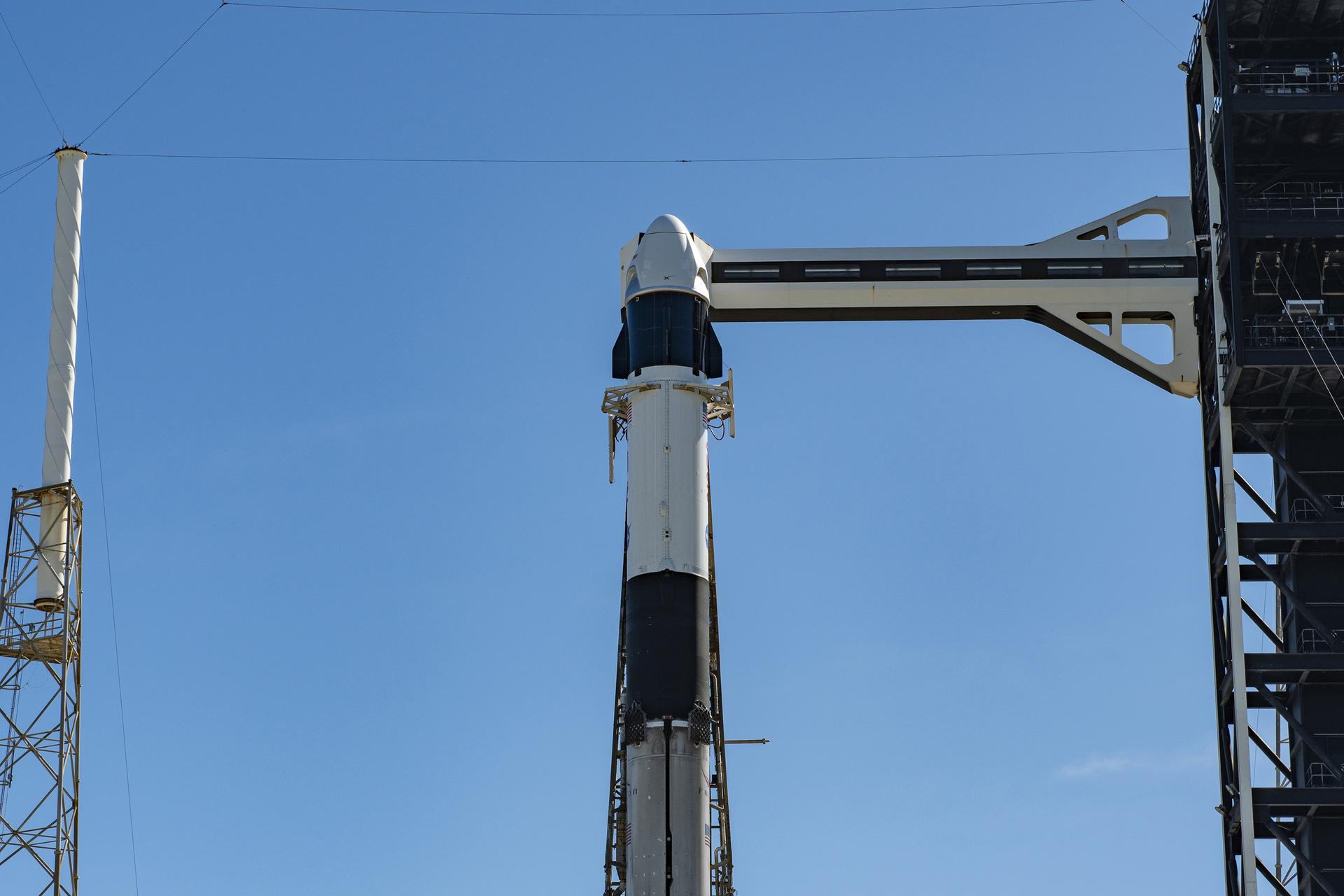 Ahead of launch of NASA’s SpaceX Crew-13 mission, a SpaceX Falcon 9 rocket, with the Dragon spacecraft atop, is vertical at the launch pad of Space Launch Complex 40 at Cape Canaveral Space Force Station in Florida on Sunday, Sept. 27, 2026. NASA astronauts Jessica Watkins and Luke Delaney, CSA (Canadian Space Agency) astronaut Joshua Kutryk, and Roscosmos cosmonaut Sergey Teteryatnikov are scheduled to launch at 11:10 a.m. EDT on Thursday, Oct. 1 to the International Space Station for the 13th crew rotation mission as part of NASA’s Commercial Crew Program. 