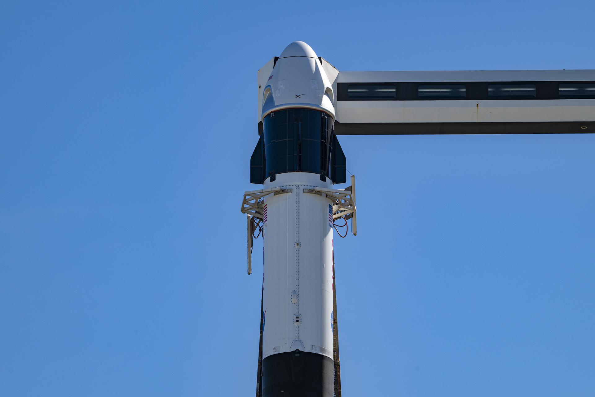 Ahead of launch of NASA’s SpaceX Crew-13 mission, a SpaceX Falcon 9 rocket, with the Dragon spacecraft atop, is vertical at the launch pad of Space Launch Complex 40 at Cape Canaveral Space Force Station in Florida on Sunday, Sept. 27, 2026. NASA astronauts Jessica Watkins and Luke Delaney, CSA (Canadian Space Agency) astronaut Joshua Kutryk, and Roscosmos cosmonaut Sergey Teteryatnikov are scheduled to launch at 11:10 a.m. EDT on Thursday, Oct. 1 to the International Space Station for the 13th crew rotation mission as part of NASA’s Commercial Crew Program. 