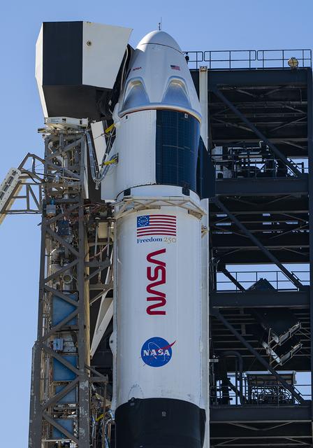 Ahead of launch of NASA’s SpaceX Crew-13 mission, a SpaceX Falcon 9 rocket, with the Dragon spacecraft atop, is vertical at the launch pad of Space Launch Complex 40 at Cape Canaveral Space Force Station in Florida on Sunday, Sept. 27, 2026. NASA astronauts Jessica Watkins and Luke Delaney, CSA (Canadian Space Agency) astronaut Joshua Kutryk, and Roscosmos cosmonaut Sergey Teteryatnikov are scheduled to launch at 11:10 a.m. EDT on Thursday, Oct. 1 to the International Space Station for the 13th crew rotation mission as part of NASA’s Commercial Crew Program. 