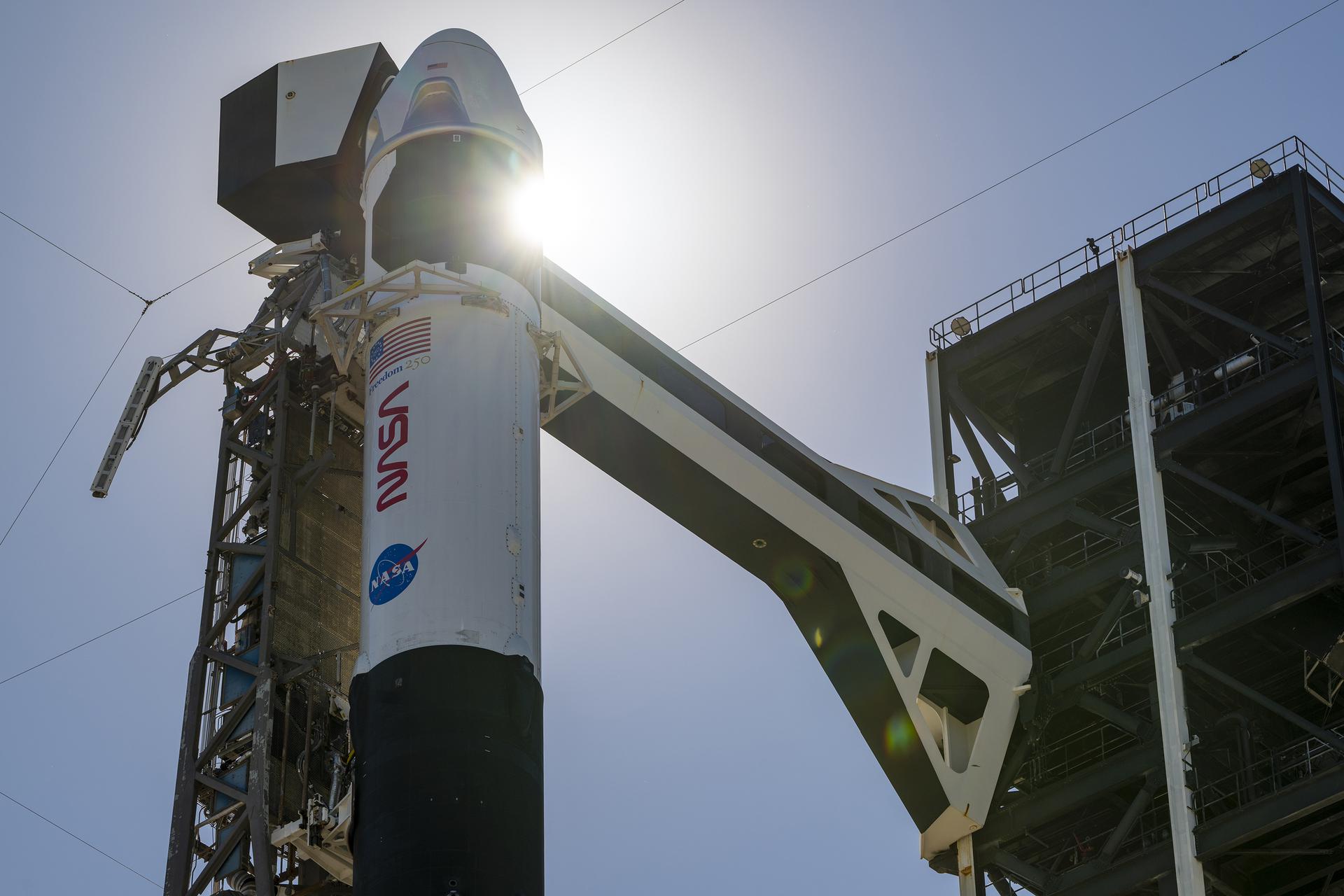 Ahead of launch of NASA’s SpaceX Crew-13 mission, a SpaceX Falcon 9 rocket, with the Dragon spacecraft atop, is vertical at the launch pad of Space Launch Complex 40 at Cape Canaveral Space Force Station in Florida on Sunday, Sept. 27, 2026. NASA astronauts Jessica Watkins and Luke Delaney, CSA (Canadian Space Agency) astronaut Joshua Kutryk, and Roscosmos cosmonaut Sergey Teteryatnikov are scheduled to launch at 11:10 a.m. EDT on Thursday, Oct. 1 to the International Space Station for the 13th crew rotation mission as part of NASA’s Commercial Crew Program. 
