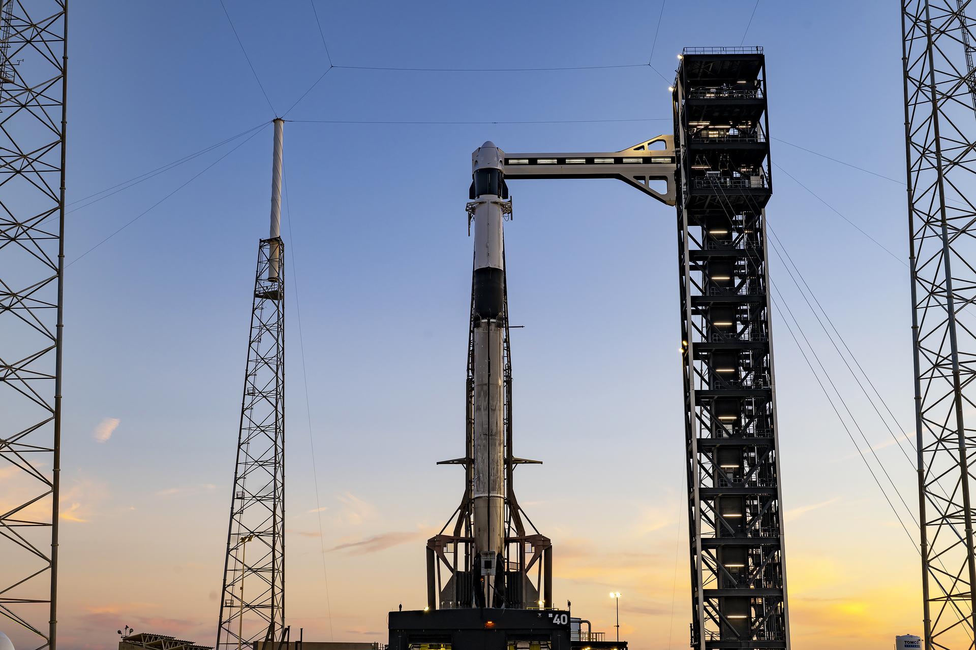 Ahead of launch of NASA’s SpaceX Crew-13 mission, a SpaceX Falcon 9 rocket, with the Dragon spacecraft atop, is vertical at the launch pad of Space Launch Complex 40 at Cape Canaveral Space Force Station in Florida on Sunday, Sept. 27, 2026. NASA astronauts Jessica Watkins and Luke Delaney, CSA (Canadian Space Agency) astronaut Joshua Kutryk, and Roscosmos cosmonaut Sergey Teteryatnikov are scheduled to launch at 11:10 a.m. EDT on Thursday, Oct. 1 to the International Space Station for the 13th crew rotation mission as part of NASA’s Commercial Crew Program. 