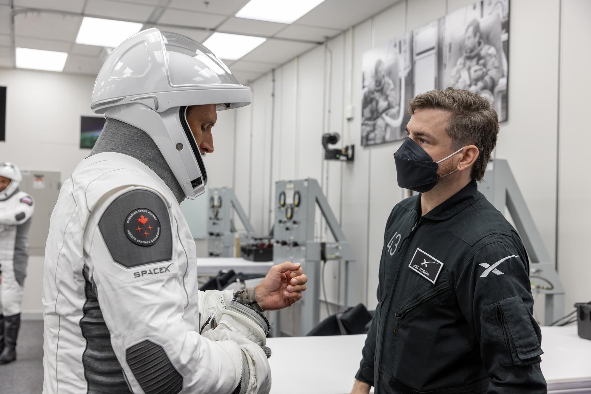 CSA (Canadian Space Agency) astronaut Joshua Kutryk conducts leak checks for his SpaceX spacesuit inside the crew suit-up room in the Neil A. Armstrong Operations and Checkout Building at the agency’s Kennedy Space Center in Florida ahead of launch of NASA’s SpaceX Crew-13 mission to the International Space Station on Thursday, Oct. 1, 2026. Kutryk, NASA astronauts Jessica Watkins and Luke Delaney, and Roscosmos cosmonaut Sergey Teteryatnikov are scheduled to lift off aboard SpaceX’s Dragon spacecraft and Falcon 9 rocket no earlier than 11:10 a.m. EDT, from Space Launch Complex 40 at Cape Canaveral Space Force Station in Florida.