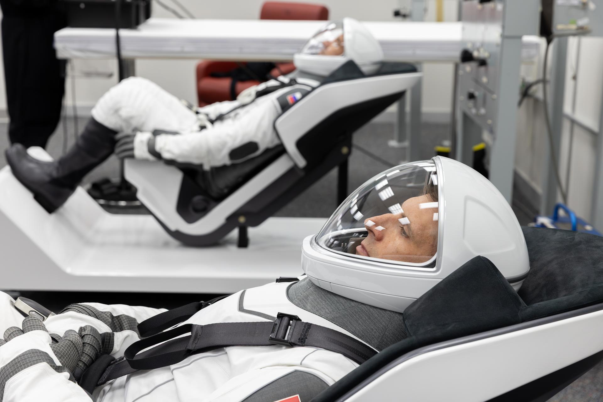 From left to right, Roscosmos cosmonaut Sergey Teteryatnikov and CSA (Canadian Space Agency) astronaut Joshua Kutryk conduct leak checks for their SpaceX spacesuits inside the crew suit-up room in the Neil A. Armstrong Operations and Checkout Building at the agency’s Kennedy Space Center in Florida ahead of launch of NASA’s SpaceX Crew-13 mission to the International Space Station on Thursday, Oct. 1, 2026. Kutryk and Teteryatnikov and NASA astronauts Jessica Watkins and Luke Delaney are scheduled to lift off aboard SpaceX’s Dragon spacecraft and Falcon 9 rocket no earlier than 11:10 a.m. EDT, from Space Launch Complex 40 at Cape Canaveral Space Force Station in Florida.