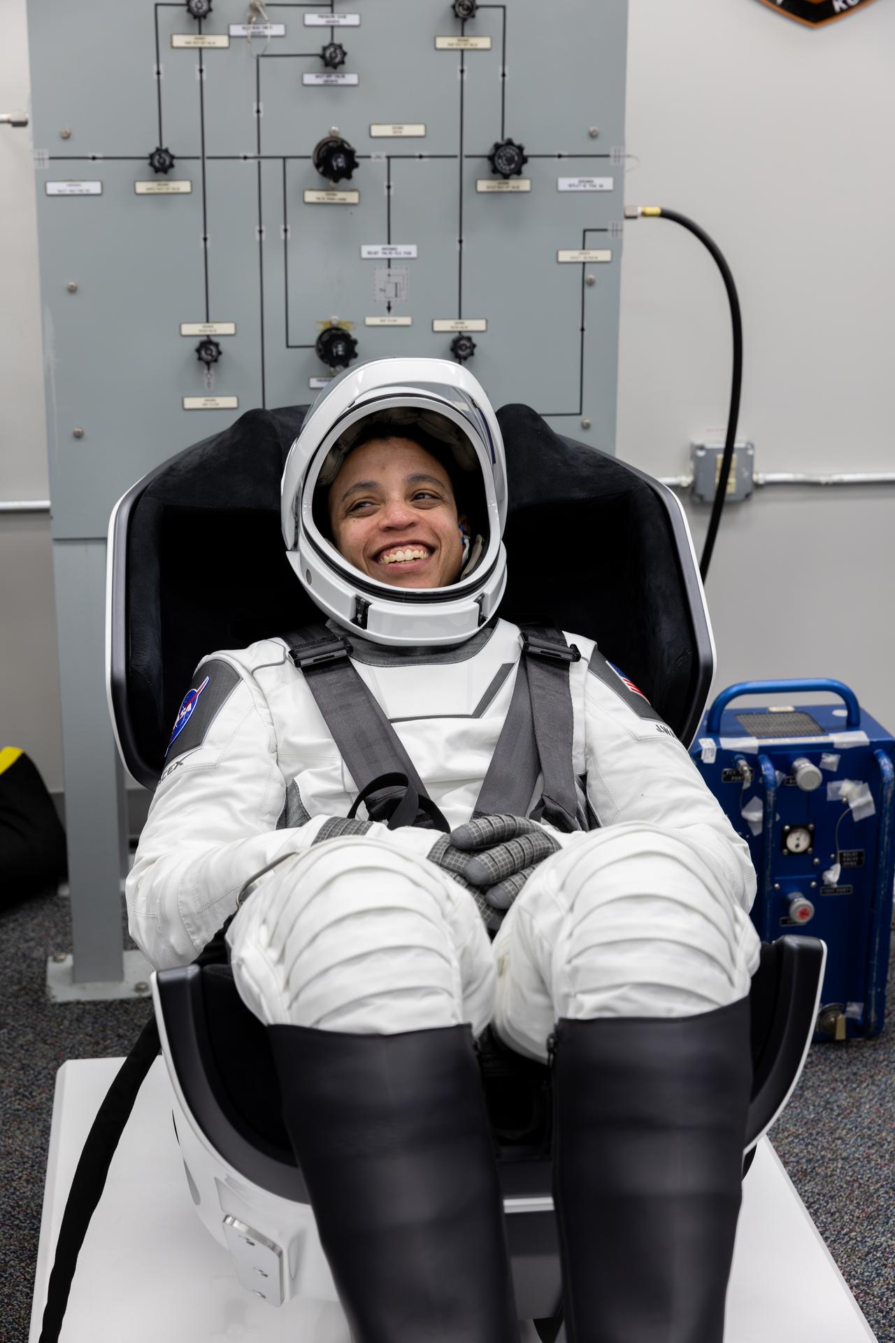 NASA astronaut Jessica Watkins conducts leak checks for her SpaceX spacesuit inside the crew suit-up room in the Neil A. Armstrong Operations and Checkout Building at the agency’s Kennedy Space Center in Florida ahead of launch of NASA’s SpaceX Crew-13 mission to the International Space Station on Thursday, Oct. 1, 2026. Watkins and fellow NASA astronaut Luke Delaney, along with CSA (Canadian Space Agency) astronaut Joshua Kutryk, and Roscosmos cosmonaut Sergey Teteryatnikov are scheduled to lift off aboard SpaceX’s Dragon spacecraft and Falcon 9 rocket no earlier than 11:10 a.m. EDT, from Space Launch Complex 40 at Cape Canaveral Space Force Station in Florida.