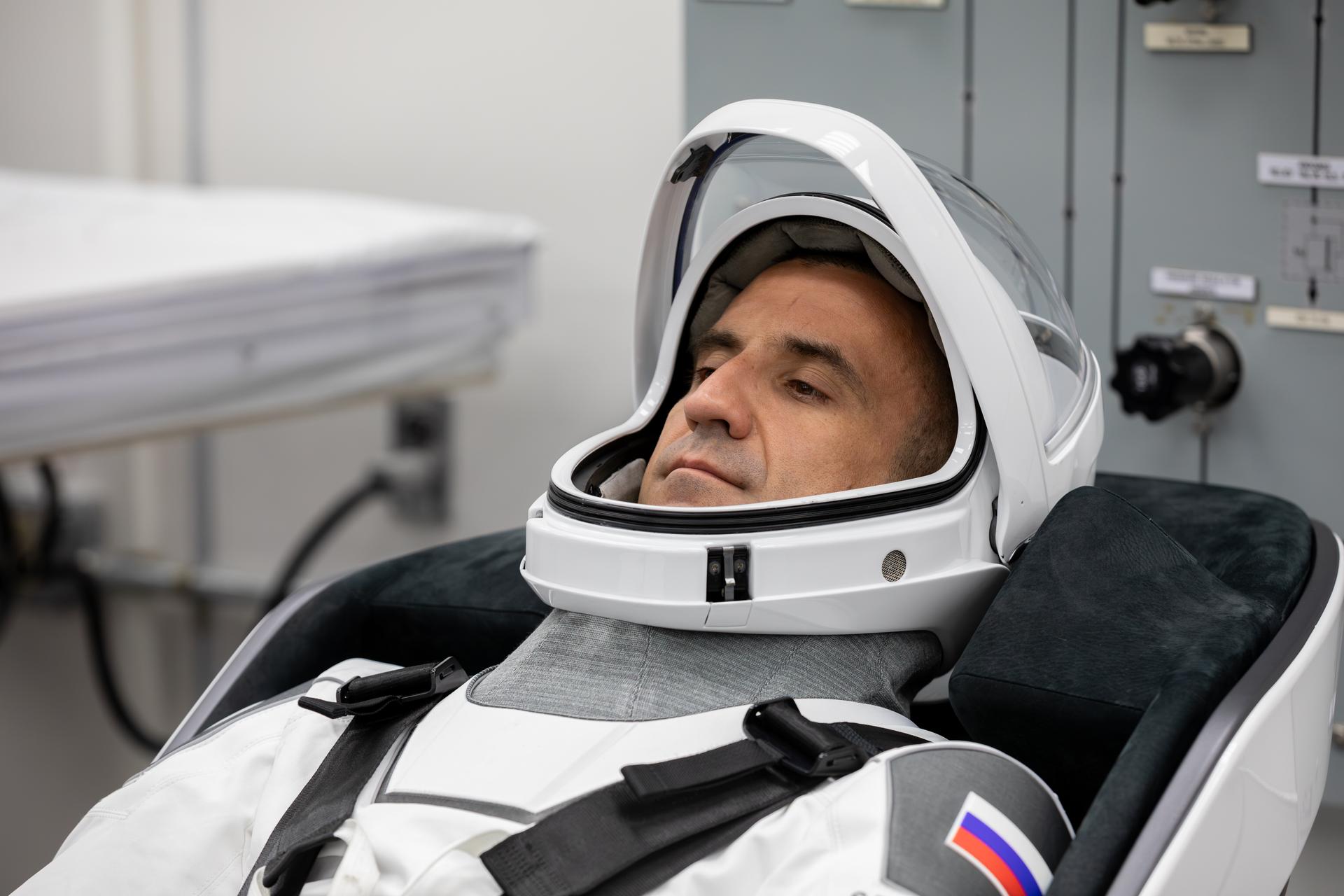 Roscosmos cosmonaut Sergey Teteryatnikov conducts leak checks for his SpaceX spacesuit inside the crew suit-up room in the Neil A. Armstrong Operations and Checkout Building at the agency’s Kennedy Space Center in Florida ahead of launch of NASA’s SpaceX Crew-13 mission to the International Space Station on Thursday, Oct. 1, 2026. NASA astronauts Jessica Watkins and Luke Delaney, CSA (Canadian Space Agency) astronaut Joshua Kutryk, and Teteryatnikov are scheduled to lift off aboard SpaceX’s Dragon spacecraft and Falcon 9 rocket no earlier than 11:10 a.m. EDT, from Space Launch Complex 40 at Cape Canaveral Space Force Station in Florida.