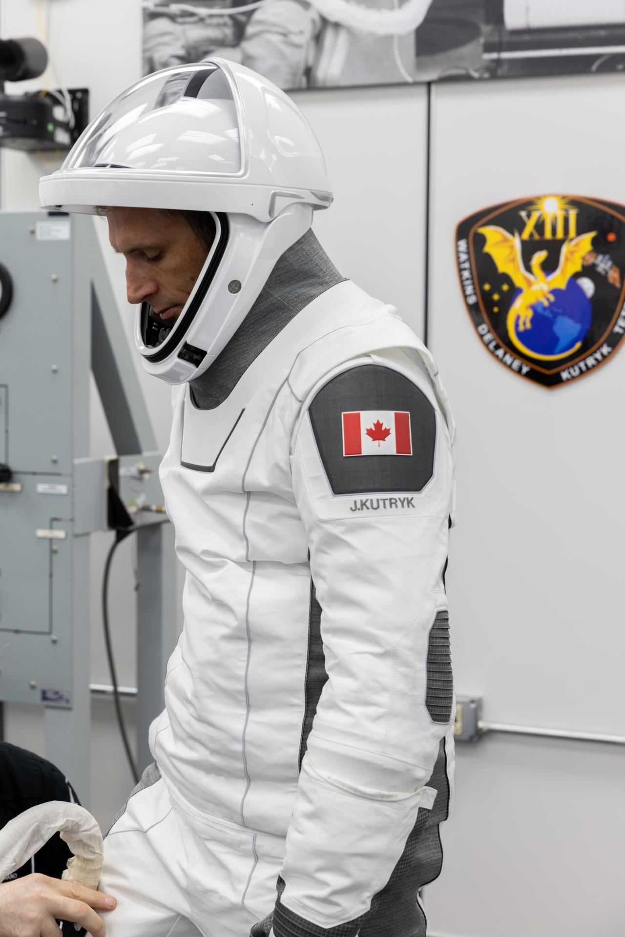 CSA (Canadian Space Agency) astronaut Joshua Kutryk conducts leak checks for his SpaceX spacesuit inside the crew suit-up room in the Neil A. Armstrong Operations and Checkout Building at the agency’s Kennedy Space Center in Florida ahead of launch of NASA’s SpaceX Crew-13 mission to the International Space Station on Thursday, Oct. 1, 2026. Kutryk, NASA astronauts Jessica Watkins and Luke Delaney, and Roscosmos cosmonaut Sergey Teteryatnikov are scheduled to lift off aboard SpaceX’s Dragon spacecraft and Falcon 9 rocket no earlier than 11:10 a.m. EDT, from Space Launch Complex 40 at Cape Canaveral Space Force Station in Florida.