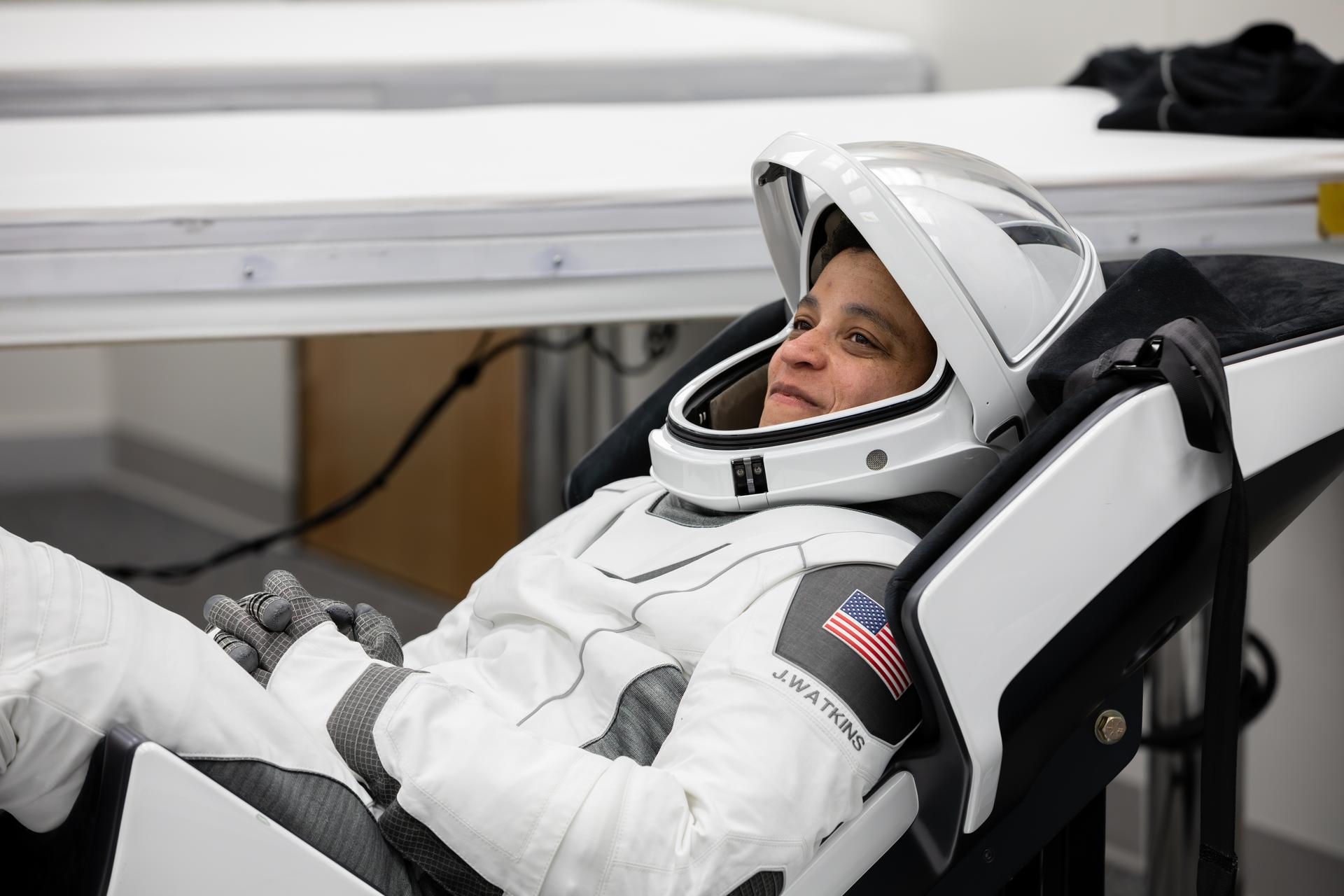 NASA astronaut Jessica Watkins conducts leak checks for her SpaceX spacesuit inside the crew suit-up room in the Neil A. Armstrong Operations and Checkout Building at the agency’s Kennedy Space Center in Florida ahead of launch of NASA’s SpaceX Crew-13 mission to the International Space Station on Thursday, Oct. 1, 2026. Watkins and fellow NASA astronaut Luke Delaney, along with CSA (Canadian Space Agency) astronaut Joshua Kutryk, and Roscosmos cosmonaut Sergey Teteryatnikov are scheduled to lift off aboard SpaceX’s Dragon spacecraft and Falcon 9 rocket no earlier than 11:10 a.m. EDT, from Space Launch Complex 40 at Cape Canaveral Space Force Station in Florida.