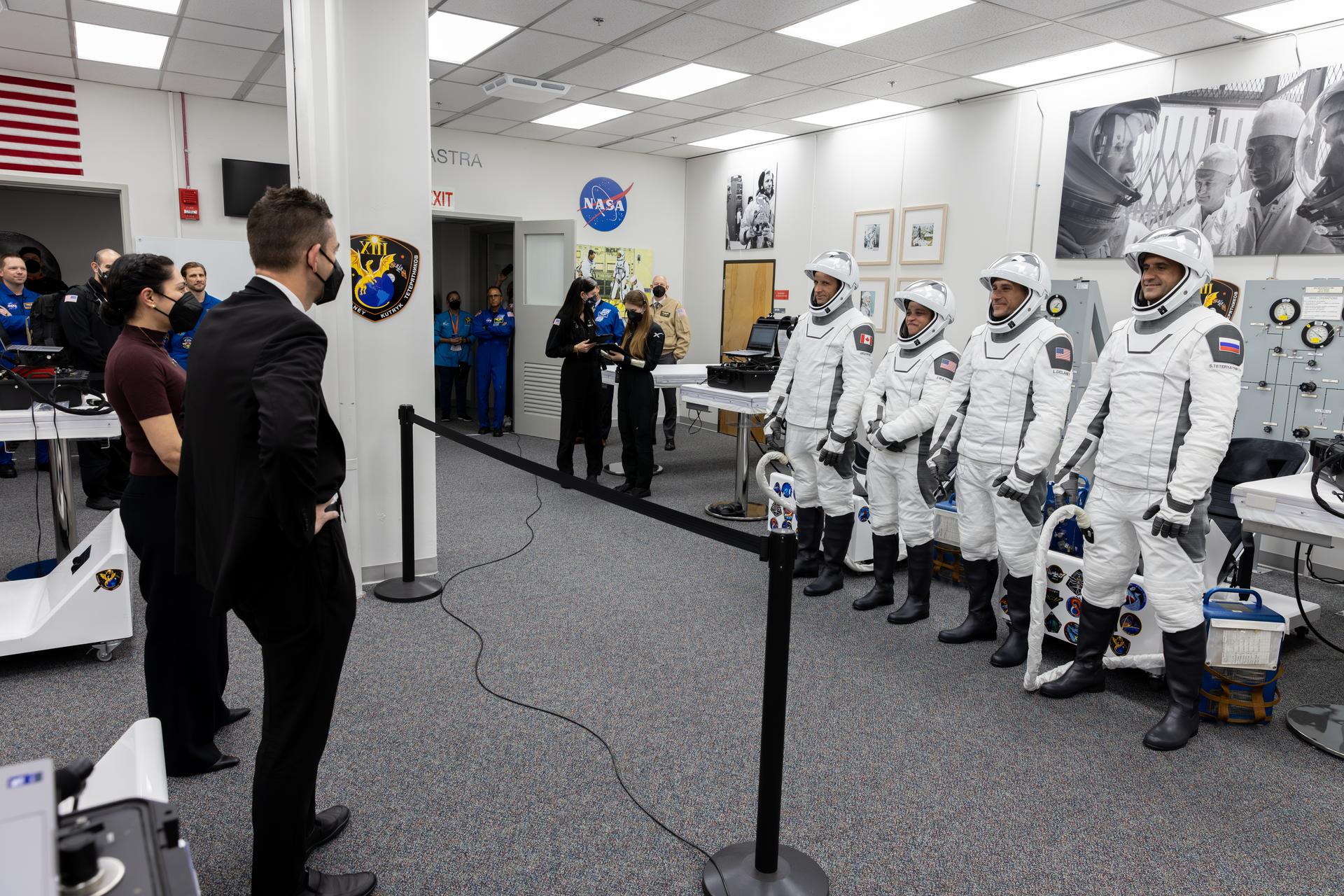 NASA Administrator Jared Isaacman speaks to NASA’s SpaceX Crew-13 members following the completion of suit leak checks in the Neil A. Armstrong Operations and Checkout Building at the agency’s Kennedy Space Center in Florida ahead of launch to the International Space Station on Thursday, Oct. 1, 2026. From left to right, CSA (Canadian Space Agency) astronaut Joshua Kutryk, and NASA astronauts Jessica Watkins and Luke Delaney, along with Roscosmos cosmonaut Sergey Teteryatnikov are scheduled to lift off aboard SpaceX’s Dragon spacecraft and Falcon 9 rocket no earlier than 11:10 a.m. EDT, from Space Launch Complex 40 at Cape Canaveral Space Force Station in Florida.