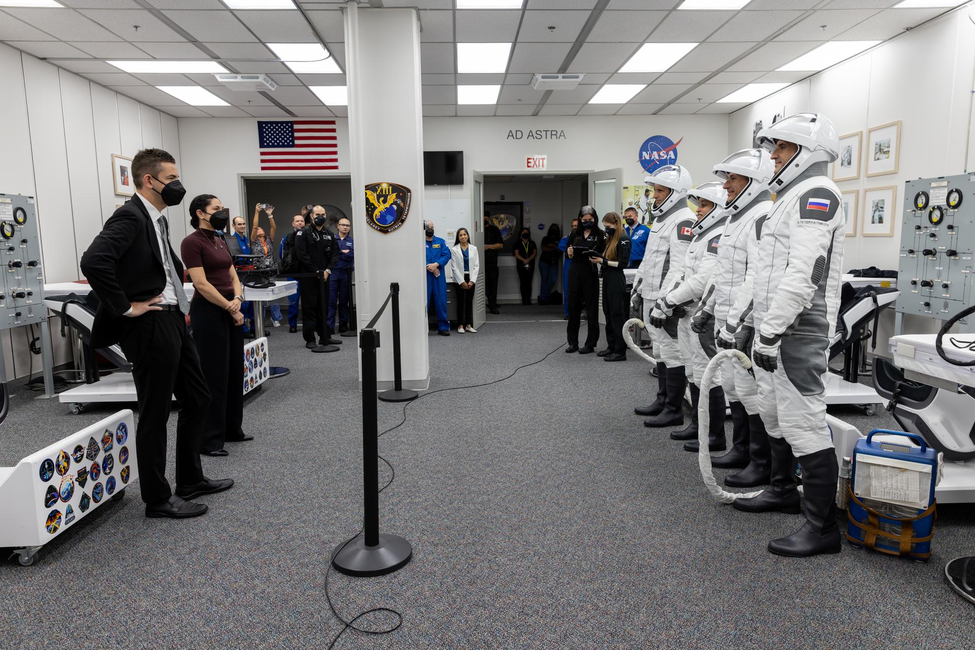 NASA Administrator Jared Isaacman speaks to NASA’s SpaceX Crew-13 members following the completion of suit leak checks in the Neil A. Armstrong Operations and Checkout Building at the agency’s Kennedy Space Center in Florida ahead of launch to the International Space Station on Thursday, Oct. 1, 2026. From left to right, CSA (Canadian Space Agency) astronaut Joshua Kutryk, and NASA astronauts Jessica Watkins and Luke Delaney, along with Roscosmos cosmonaut Sergey Teteryatnikov are scheduled to lift off aboard SpaceX’s Dragon spacecraft and Falcon 9 rocket no earlier than 11:10 a.m. EDT, from Space Launch Complex 40 at Cape Canaveral Space Force Station in Florida.