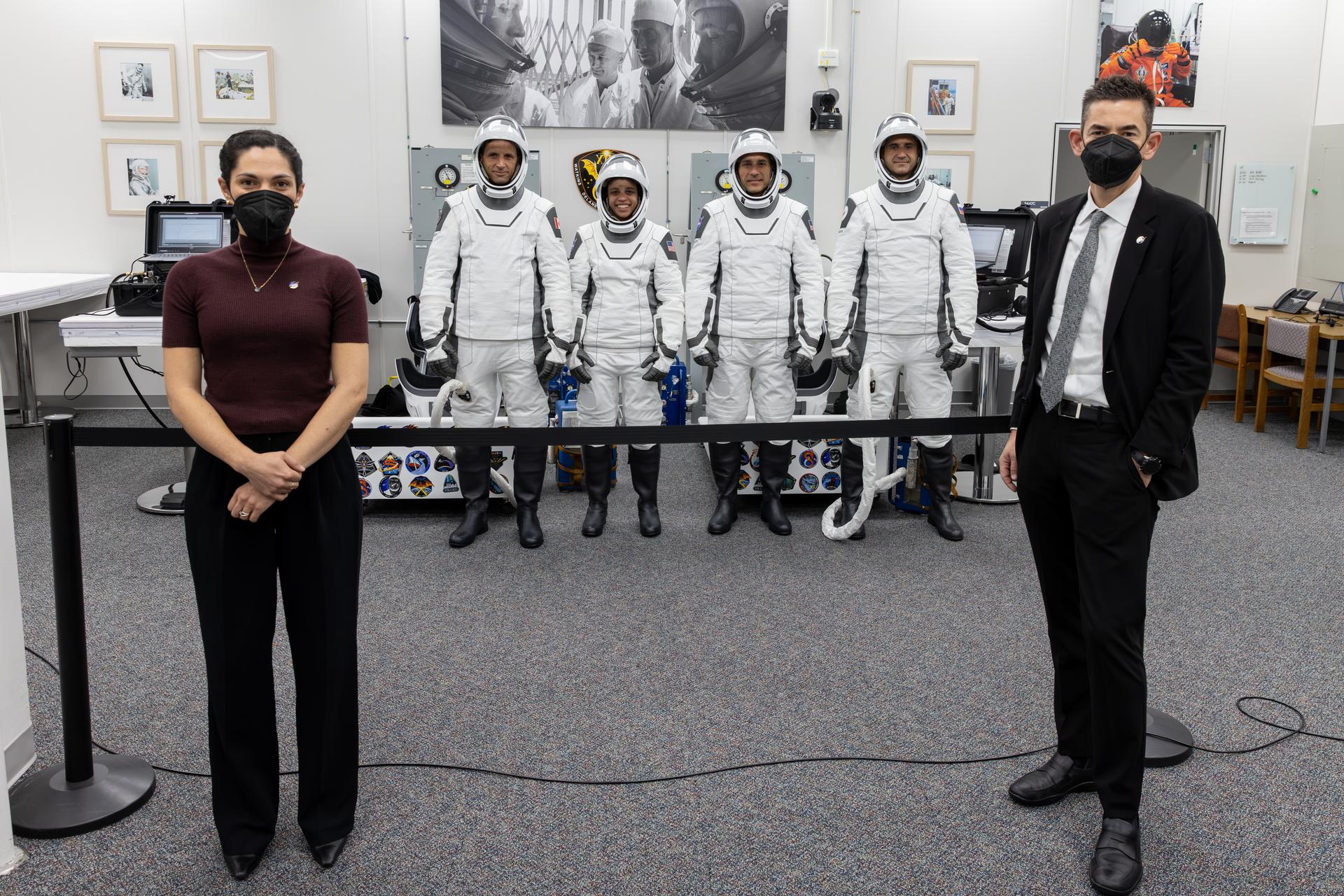 From left to right, NASA’s SpaceX Crew-13 members, from left to right, CSA (Canadian Space Agency) astronaut Joshua Kutryk, and NASA astronauts Jessica Watkins and Luke Delaney, along with Roscosmos cosmonaut Sergey Teteryatnikov, and NASA administrator Jared Isaacman pose for a photograph following the completion of suit leak checks in the Neil A. Armstrong Operations and Checkout Building at the agency’s Kennedy Space Center in Florida ahead of launch to the International Space Station on Thursday, Oct. 1, 2026. Crew-13 is scheduled to lift off aboard SpaceX’s Dragon spacecraft and Falcon 9 rocket no earlier than 11:10 a.m. EDT, from Space Launch Complex 40 at Cape Canaveral Space Force Station in Florida.