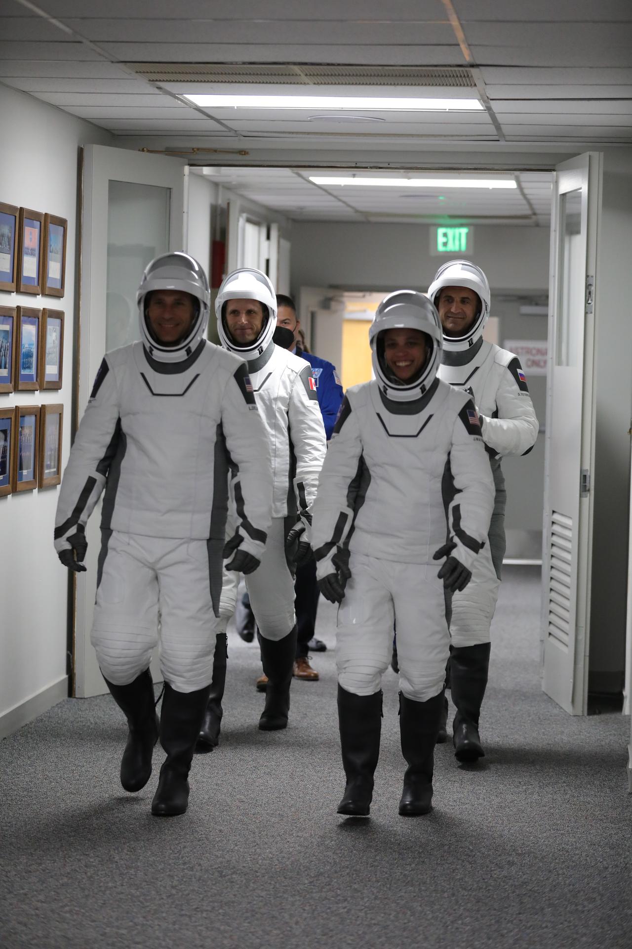 From left to right, NASA astronauts Luke Delaney and Jessica Watkins, along with Roscosmos cosmonaut Sergey Teteryatnikov and CSA (Canadian Space Agency) astronaut Joshua Kutryk prepare to depart the Neil A. Armstrong Operations and Checkout Building at the agency’s Kennedy Space Center in Florida ahead of the Crew-13 launch on Thursday, Oct. 1, 2026. NASA astronauts Jessica Watkins and Luke Delaney, CSA (Canadian Space Agency) astronaut Joshua Kutryk, and Roscosmos cosmonaut Sergey Teteryatnikov are scheduled to lift off aboard SpaceX’s Dragon spacecraft and Falcon 9 rocket at 11:10 a.m. EDT, from Space Launch Complex 40 at Cape Canaveral Space Force Station in Florida.