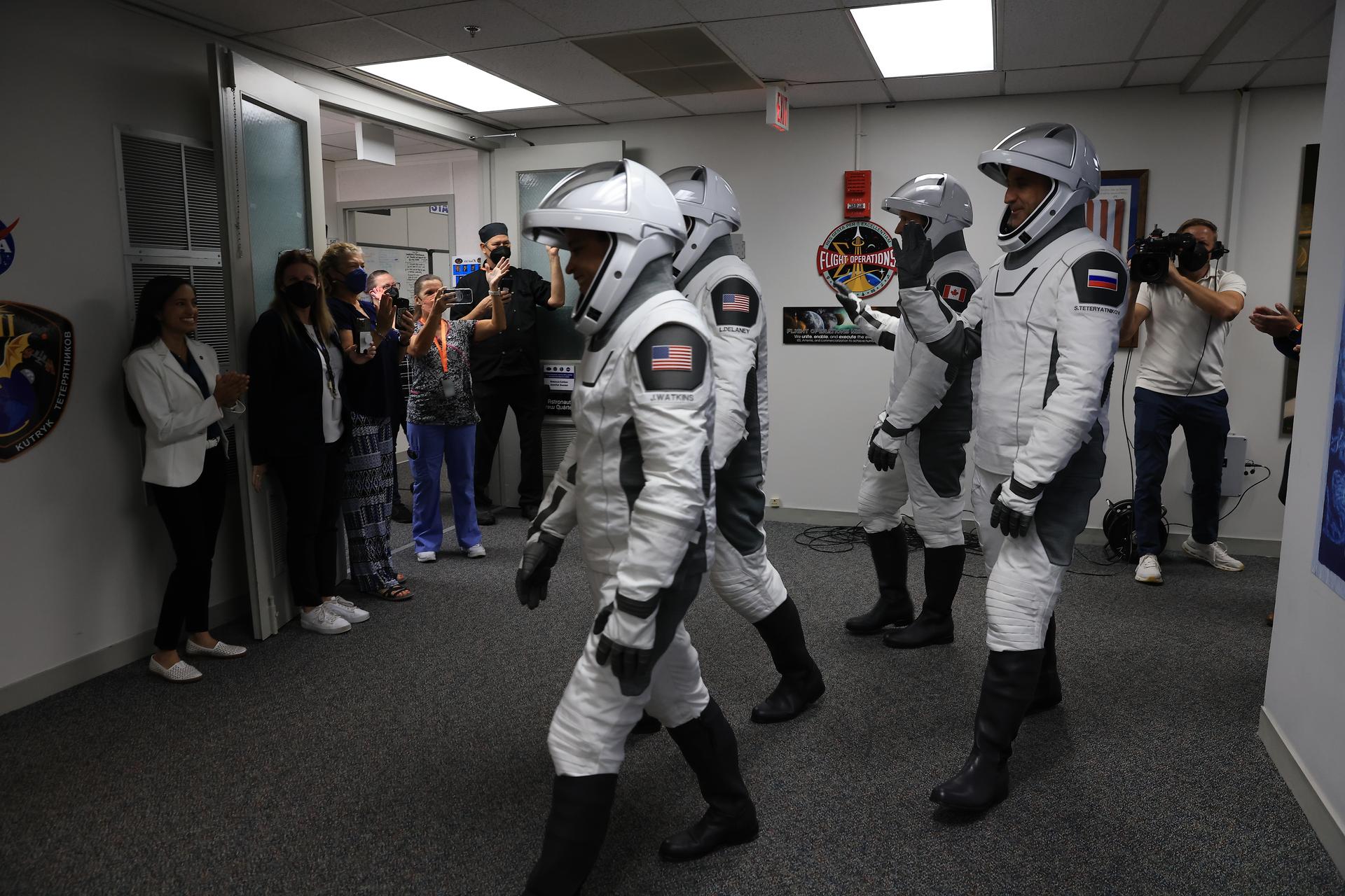 NASA’s SpaceX Crew-13 NASA astronauts Luke Delaney and Jessica Watkins, along with Roscosmos cosmonaut Sergey Teteryatnikov and CSA (Canadian Space Agency) astronaut Joshua Kutryk prepare to depart the Neil A. Armstrong Operations and Checkout Building at the agency’s Kennedy Space Center in Florida ahead of the Crew-13 launch on Thursday, Oct. 1, 2026. Crew-13 is scheduled to lift off aboard SpaceX’s Dragon spacecraft and Falcon 9 rocket no earlier than 11:10 a.m. EDT, from Space Launch Complex 40 at Cape Canaveral Space Force Station in Florida.