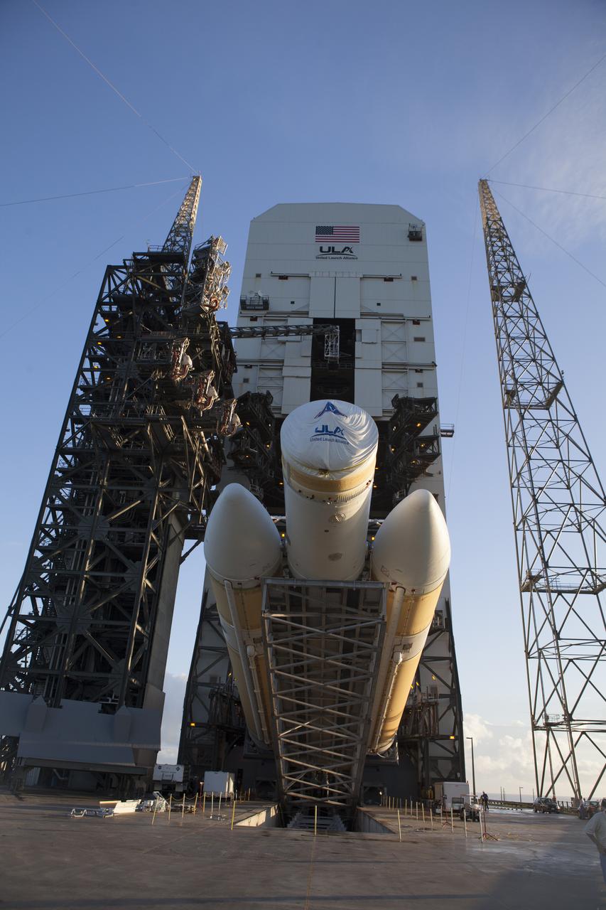 The United Launch Alliance Delta IV Heavy rocket for Exploration Flight Test-1 is being lifted to the vertical position at the pad at Space Launch Complex 37 at Cape Canaveral Air Force Station in Florida. The Delta IV Heavy is being readied to launch Orion on its first flight test. During its first flight test, Orion will travel farther into space than any human spacecraft has gone in more than 40 years. The data gathered during the flight will influence design decisions, validate existing computer models and innovative new approaches to space systems development, as well as reduce overall mission risks and costs for later Orion flights. Liftoff of Orion on the first flight test is planned for December 2014.