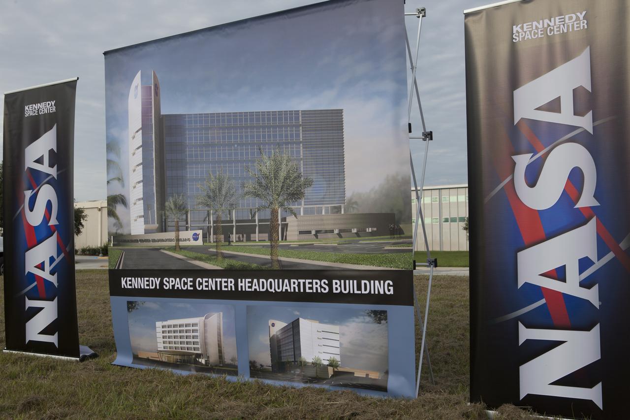Groundbreaking for the new Central Campus will take place in the Industrial Area at NASA's Kennedy Space Center in Florida. NASA banners and an artist rendering of the new facility have been set up for the ceremony. Kennedy is transforming into a multi-user, 21st century spaceport supporting both commercial and government users and operations. Central Campus Phase I includes construction of a new Headquarters Building as one of the major components of the strategy. The new Headquarters Building will be a seven-story, 200,000-square-foot facility that will house about 500 NASA civil service and contractor employees.