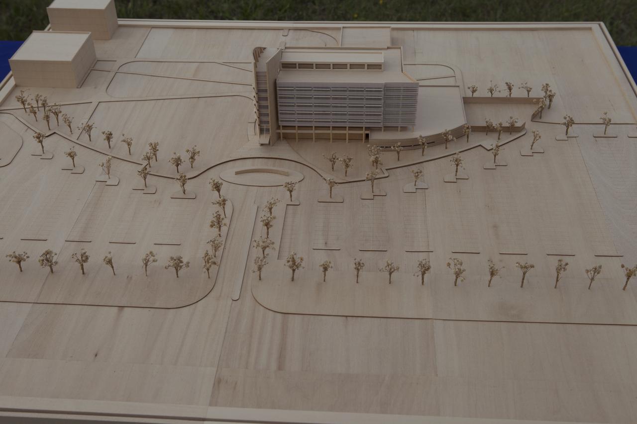 Groundbreaking for the new Central Campus will take place in the Industrial Area at NASA's Kennedy Space Center in Florida. A scale model of the new facility and landscaping is on display for the ceremony. Kennedy is transforming into a multi-user, 21st century spaceport supporting both commercial and government users and operations. Central Campus Phase I includes construction of a new Headquarters Building as one of the major components of the strategy. The new Headquarters Building will be a seven-story, 200,000-square-foot facility that will house about 500 NASA civil service and contractor employees.