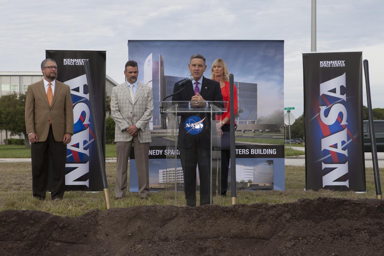 Groundbreaking for the new Central Campus took place in the Industrial Area at NASA's Kennedy Space Center in Florida. Kennedy Center Director Bob Cabana speaks to members of the media and guests during the ceremony. Behind Cabana is Nancy Bray, director of Kennedy's Center Operations Directorate. From far left, are Steve Belflower, vice president of HuntonBrady Architects of Orlando, and Kirk Hazen, southeast district manager and vice president of Hensel Phelps, the construction contractor. Kennedy is transforming into a multi-user, 21st century spaceport supporting both commercial and government users and operations. Central Campus Phase I includes construction of a new Headquarters Building as one of the major components of the strategy. The new Headquarters Building will be a seven-story, 200,000-square-foot facility that will house about 500 NASA civil service and contractor employees.
