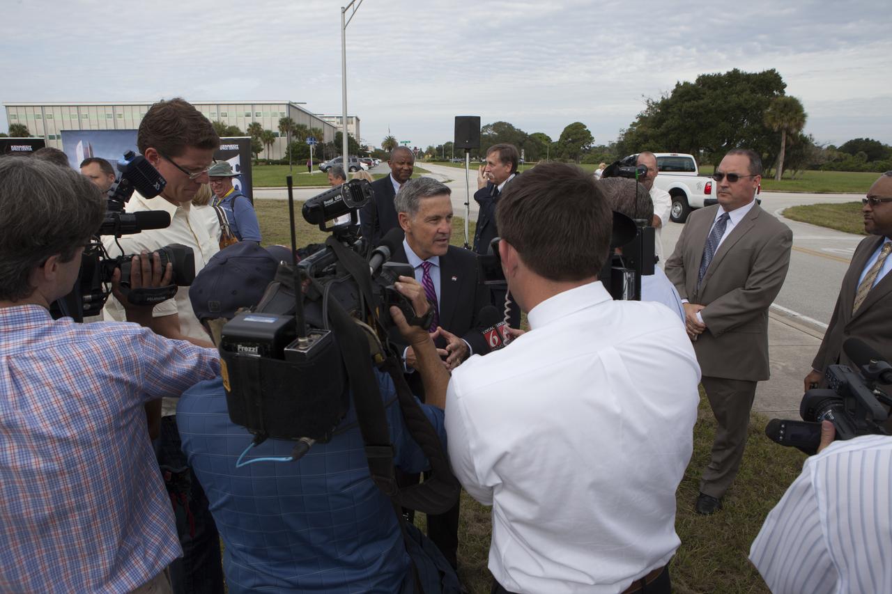 Groundbreaking for the new Central Campus took place in the Industrial Area at NASA's Kennedy Space Center in Florida. Kennedy's Center Director Bob Cabana speaks to members of the media after the groundbreaking ceremony. Kennedy is transforming into a multi-user, 21st century spaceport supporting both commercial and government users and operations. Central Campus Phase I includes construction of a new Headquarters Building as one of the major components of the strategy. The new Headquarters Building will be a seven-story, 200,000-square-foot facility that will house about 500 NASA civil service and contractor employees.