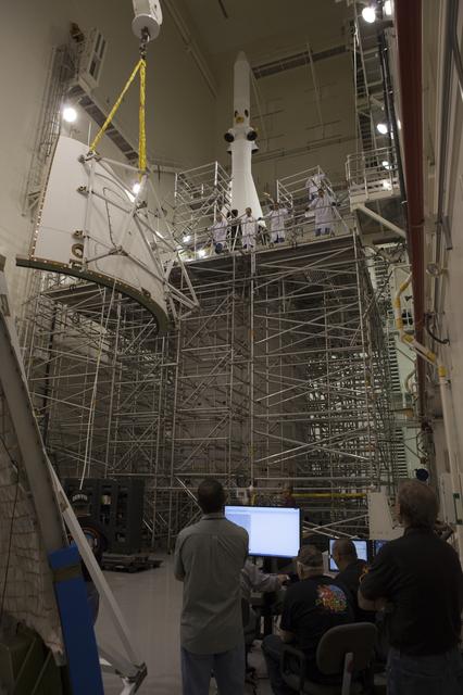 NASA image: First Ogive Panel Installed on Orion