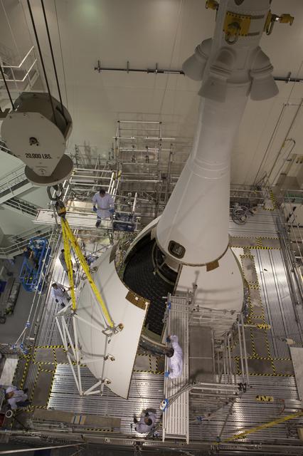 NASA image: 180° Ogive Panel Installed on Orion
