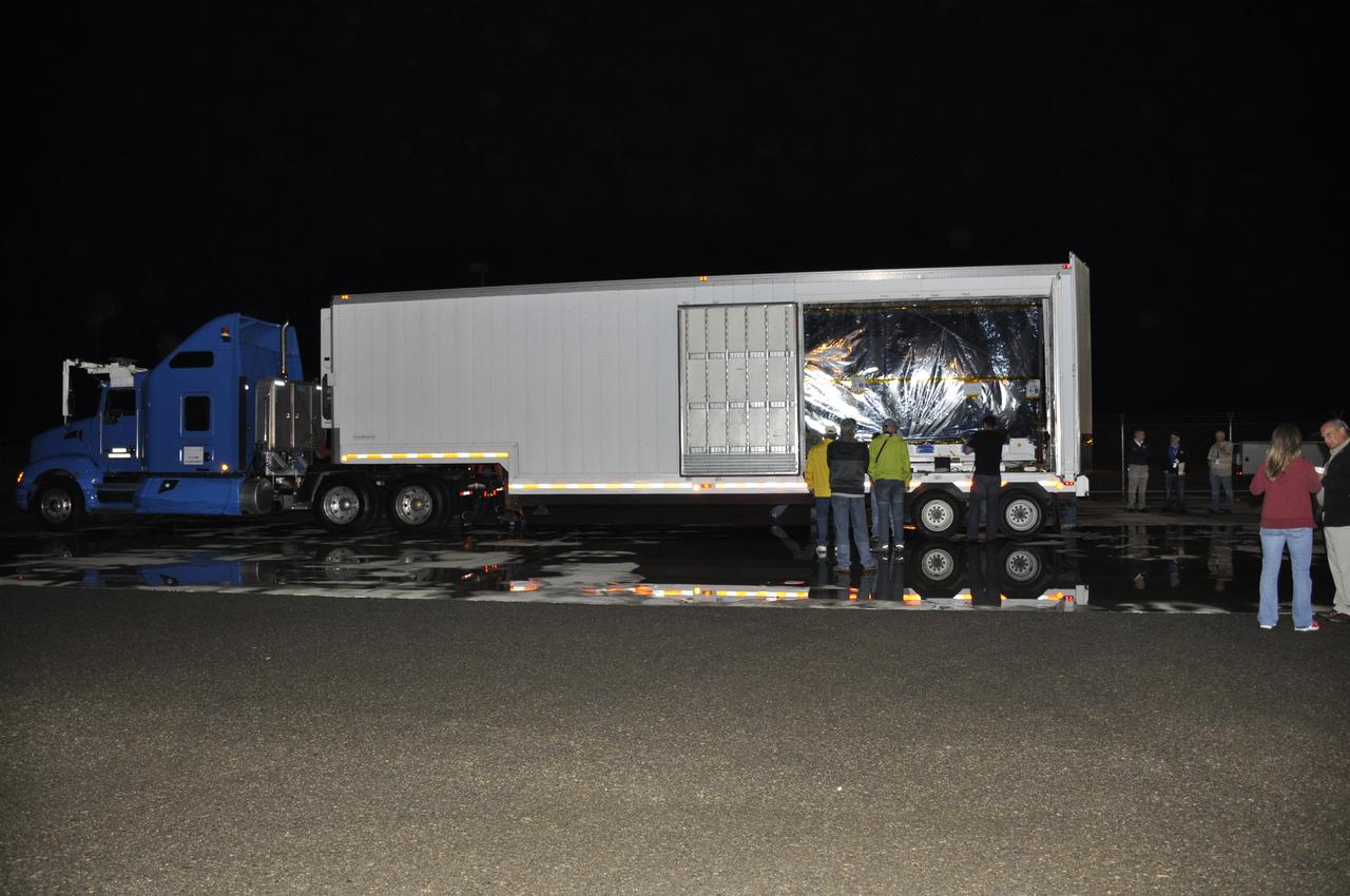 Operations are underway to offload NASA's Soil Moisture Active Passive, or SMAP, spacecraft from the truck that delivered it from the Jet Propulsion Laboratory in Pasadena, California, to the Astrotech payload processing facility on Vandenberg Air Force Base in California. SMAP will launch on a Delta II 7320 configuration vehicle featuring a United Launch Alliance first stage booster powered by an Aerojet Rocketdyne RS-27A main engine and three Alliant Techsystems, or ATK, strap-on solid rocket motors. Once on station in Earth orbit, SMAP will provide global measurements of soil moisture and its freeze/thaw state. These measurements will be used to enhance understanding of processes that link the water, energy and carbon cycles, and to extend the capabilities of weather and climate prediction models. SMAP data also will be used to quantify net carbon flux in boreal landscapes and to develop improved flood prediction and drought monitoring capabilities. Launch from Space Launch Complex 2 is targeted for Jan. 29, 2015.