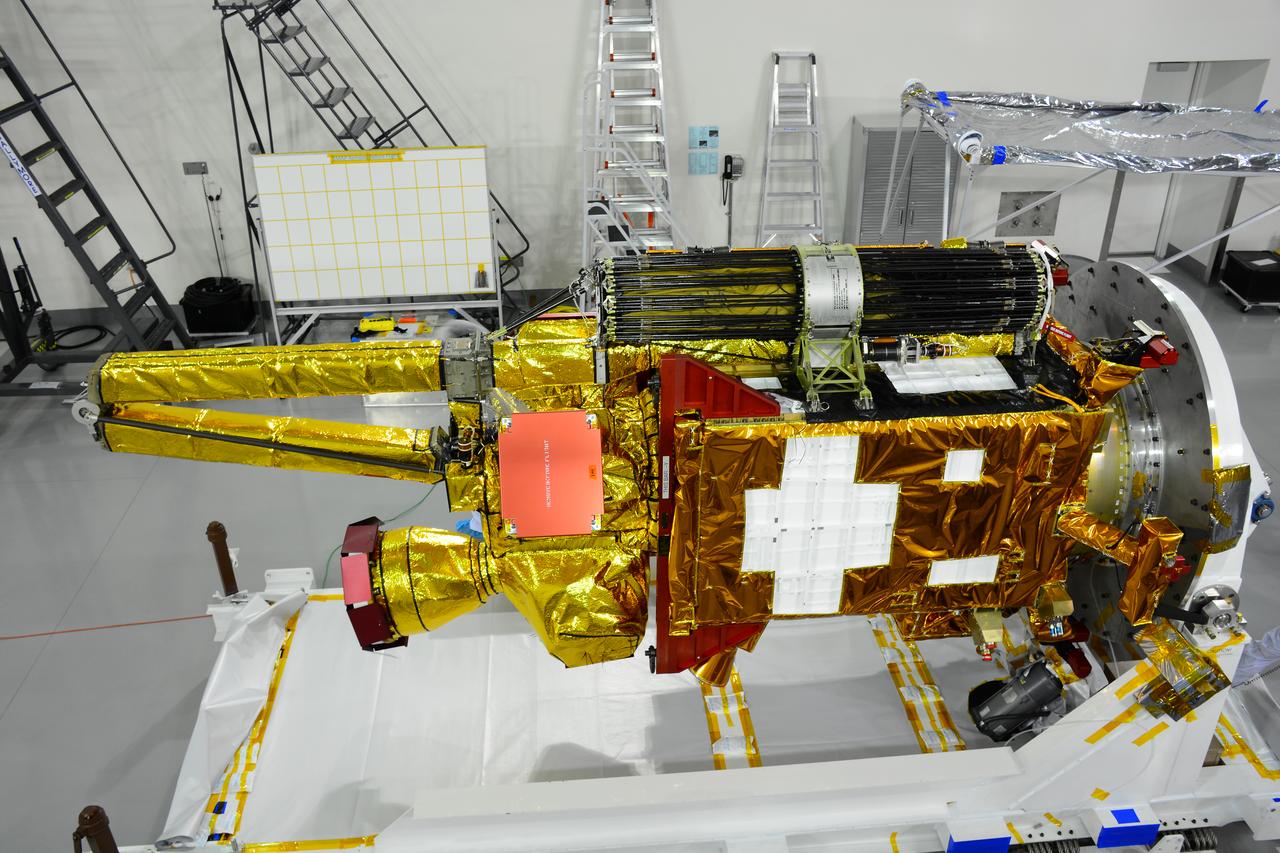 Inside the Astrotech payload processing facility on Vandenberg Air Force Base in California, processing has begun on NASA's Soil Moisture Active Passive, or SMAP, spacecraft. SMAP will launch on a Delta II 7320 configuration vehicle featuring a United Launch Alliance first stage booster powered by an Aerojet Rocketdyne RS-27A main engine and three Alliant Techsystems, or ATK, strap-on solid rocket motors. Once on station in Earth orbit, SMAP will provide global measurements of soil moisture and its freeze/thaw state. These measurements will be used to enhance understanding of processes that link the water, energy and carbon cycles, and to extend the capabilities of weather and climate prediction models. SMAP data also will be used to quantify net carbon flux in boreal landscapes and to develop improved flood prediction and drought monitoring capabilities. Launch from Space Launch Complex 2 is targeted for Jan. 29, 2015. 