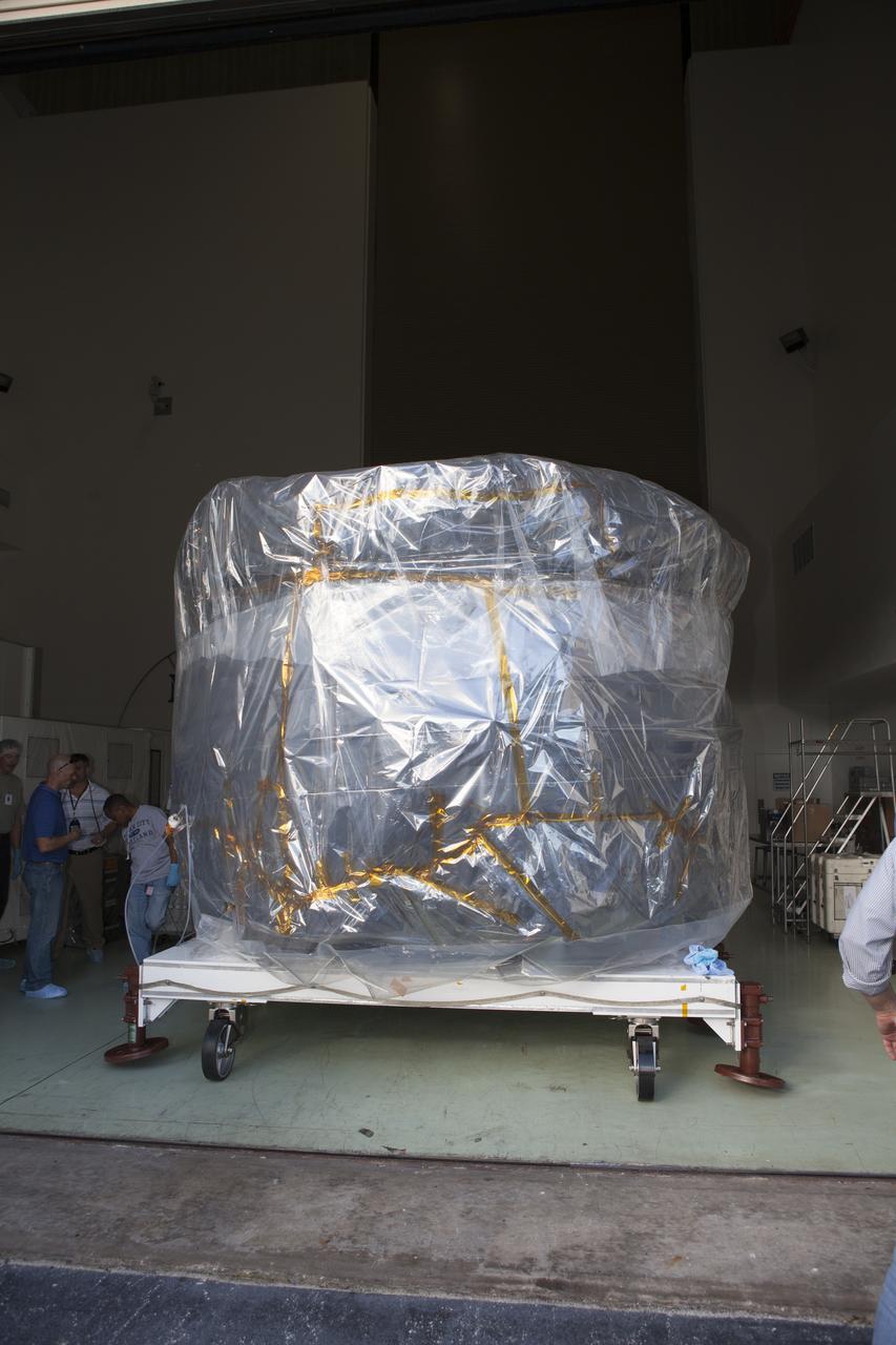 Two of the observatories, the lower stack, mini-stack number 1, for NASA's Magnetospheric Multiscale Observatory, or MMS, arrive in the Building 1 airlock at the Astrotech payload processing facility in Titusville, Florida, near Kennedy Space Center. The MMS upper stack, mini-stack number 2, is scheduled to arrive in about two weeks. MMS is a Solar Terrestrial Probes mission comprising four identically instrumented spacecraft that will use Earth’s magnetosphere as a laboratory to study the microphysics of three fundamental plasma processes: magnetic reconnection, energetic particle acceleration and turbulence. Launch aboard a United Launch Alliance Atlas V rocket from Space Launch Complex 41 on Cape Canaveral Air Force Station is targeted for March 12, 2015. 