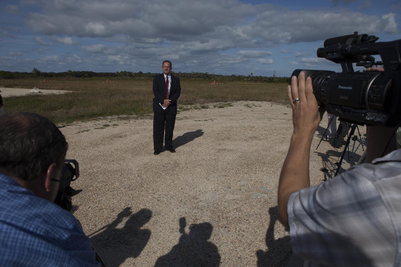 Tom Engler, deputy director of Center Planning and Development at NASA's Kennedy Space Center in Florida, speaks to members of the media during an event to announce the agency's Lunar Cargo Transportation and Landing by Soft Touchdown, or Lunar CATALYST, initiative and introduced one of the partners, Moon Express Inc. of Moffett Field, California. The event took place at Kennedy's automated landing and hazard avoidance technology, or ALHAT, hazard field at the north end of the Shuttle Landing Facility. Moon Express is developing a lander with capabilities that will enable delivery of payloads to the surface of the moon, as well as new science and exploration missions of interest to NASA and scientific and academic communities. Moon Express will base its activities at Kennedy and utilize the Morpheus ALHAT field and a hangar nearby for CATALYST testing. The Advanced Exploration Systems Division of NASA's Human Exploration and Operations Mission Directorate manages Lunar CATALYST.