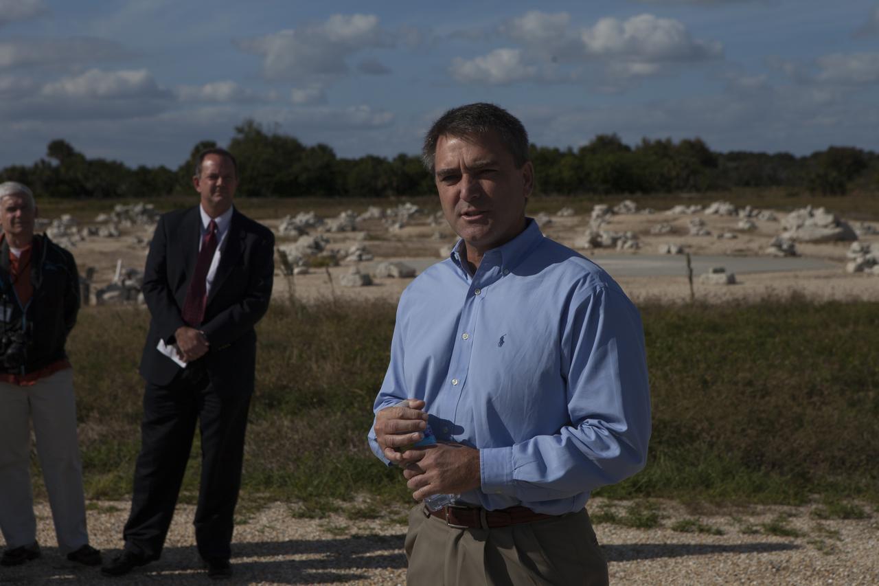 Greg C. Shavers, Lander Technology director at Marshall Space Flight Center in Alabama, speaks to members of the media during an event to announce the agency's Lunar Cargo Transportation and Landing by Soft Touchdown, or Lunar CATALYST, initiative and introduced one of the partners, Moon Express Inc. of Moffett Field, California. The event took place at Kennedy's automated landing and hazard avoidance technology, or ALHAT, hazard field at the north end of the Shuttle Landing Facility. Moon Express is developing a lander with capabilities that will enable delivery of payloads to the surface of the moon, as well as new science and exploration missions of interest to NASA and scientific and academic communities. Moon Express will base its activities at Kennedy and utilize the Morpheus ALHAT field and a hangar nearby for CATALYST testing. The Advanced Exploration Systems Division of NASA's Human Exploration and Operations Mission Directorate manages Lunar CATALYST. 
