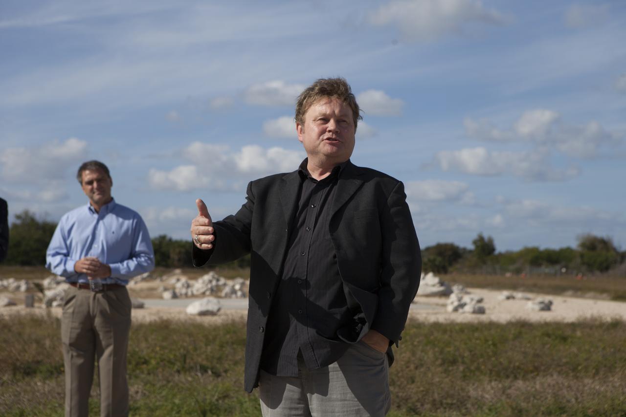Bob Richards, co-founder and chief executive officer of Moon Express Inc., of Moffett Field, California, speaks to the media during an event to announce the company's selection to use Kennedy Space Center's facilities as part of NASA's Lunar Cargo Transportation and Landing by Soft Touchdown, or Lunar CATALYST, initiative. The event took place at Kennedy's automated landing and hazard avoidance technology, or ALHAT, hazard field at the north end of the Shuttle Landing Facility. Moon Express is developing a lander with capabilities that will enable delivery of payloads to the surface of the moon, as well as new science and exploration missions of interest to NASA and scientific and academic communities. Moon Express will base its activities at Kennedy and utilize the Morpheus ALHAT field and a hangar nearby for CATALYST testing. The Advanced Exploration Systems Division of NASA's Human Exploration and Operations Mission Directorate manages Lunar CATALYST.