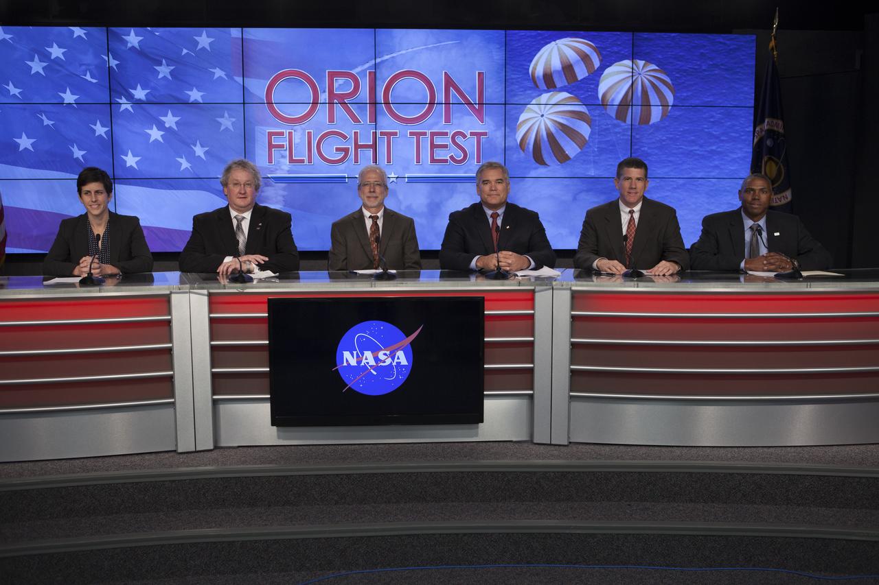 In the Kennedy Space Center’s Press Site auditorium, members of the news media are briefed on the upcoming Orion flight test. From left are: Rachel Kraft, NASA Public Affairs, Bill Hill, NASA deputy associate administrator for Exploration Systems Development, Mark Geyer, NASA Orion Program manager, Bryan Austin, Lockheed Martin mission manager, Jeremy Graeber, Operations Integration Branch of Ground Systems Development and Operations at Kennedy, and Ron Fortson, United Launch Alliance director of Mission Management. Mike Sarafin, NASA's lead flight director, participated by video from the Johnson Space Center. Orion is the exploration spacecraft designed to carry astronauts to destinations not yet explored by humans, including an asteroid and Mars. It will have emergency abort capability, sustain the crew during space travel and provide safe re-entry from deep space return velocities. The first unpiloted flight test of Orion is scheduled to launch Dec. 4, 2014 atop a United Launch Alliance Delta IV Heavy rocket, and in 2018 on NASA’s Space Launch System rocket. 