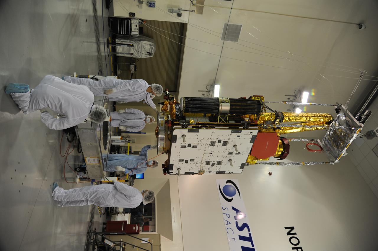NASA's Soil Moisture Active Passive, or SMAP, spacecraft is lifted from its workstand in the clean room of the Astrotech payload processing facility on Vandenberg Air Force Base in California during operations to determine its weight. The weighing of a spacecraft is standard procedure during prelaunch processing. SMAP will launch on a Delta II 7320 configuration vehicle featuring a United Launch Alliance first stage booster powered by an Aerojet Rocketdyne RS-27A main engine and three Alliant Techsystems, or ATK, strap-on solid rocket motors. Once on station in Earth orbit, SMAP will provide global measurements of soil moisture and its freeze/thaw state. NASA's Jet Propulsion Laboratory that built the observatory and its radar instrument also is responsible for SMAP project management and mission operations. Launch from Space Launch Complex 2 is targeted for Jan. 29, 2015. 