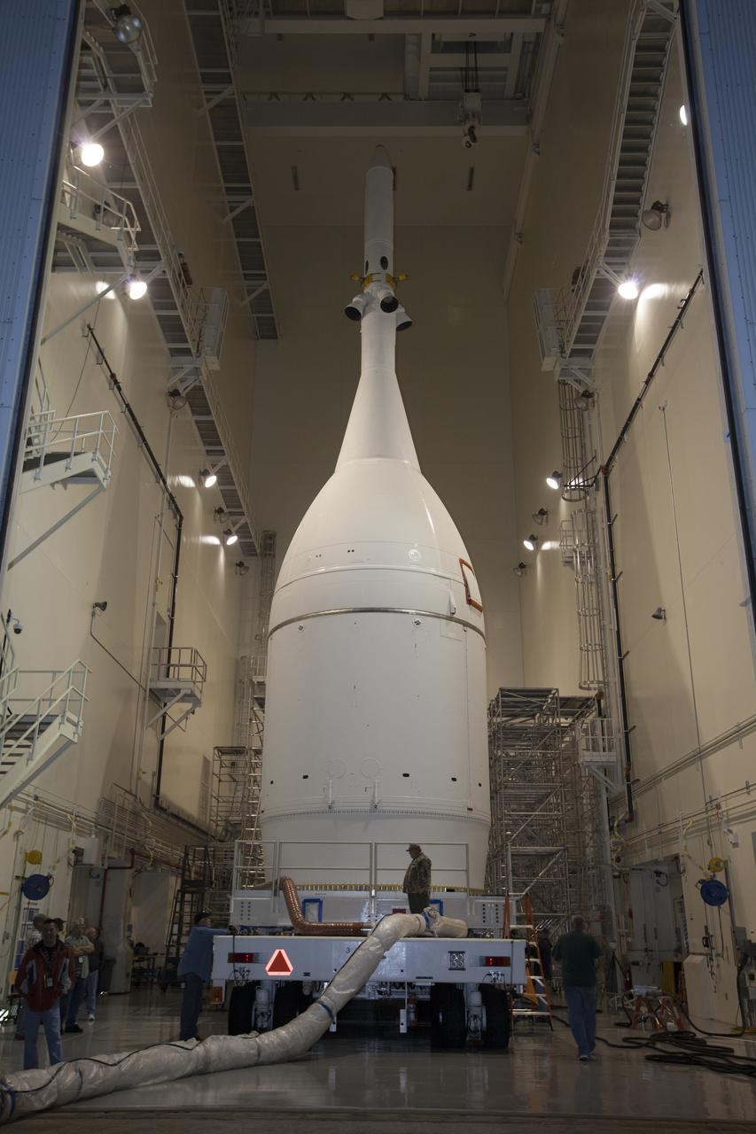 At NASA's Kennedy Space Center in Florida, the agency's completed Orion spacecraft begins its trip from the Launch Abort System Facility to Launch Complex 37 at Cape Canaveral Air Force Station. After arrival at the launch pad, United Launch Alliance engineers and technicians will lift Orion and mount it atop its Delta IV Heavy rocket. Orion is the exploration spacecraft designed to carry astronauts to destinations not yet explored by humans, including an asteroid and Mars. It will have emergency abort capability, sustain the crew during space travel and provide safe re-entry from deep space return velocities. The first unpiloted flight test of Orion is scheduled to launch Dec. 4, 2014 atop a United Launch Alliance Delta IV Heavy rocket, and in 2018 on NASA’s Space Launch System rocket.