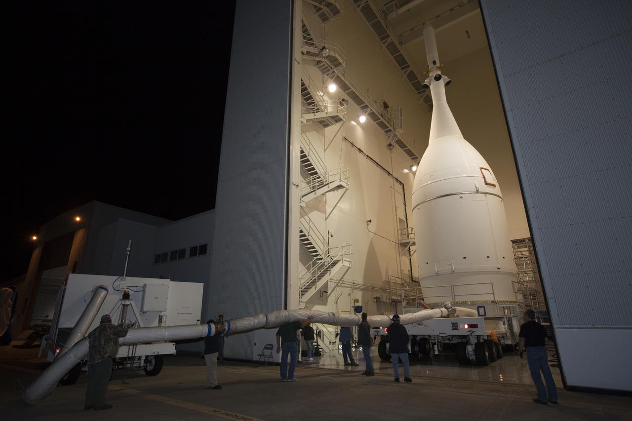 At NASA's Kennedy Space Center in Florida, the agency's completed Orion spacecraft begins its trip from the Launch Abort System Facility to Launch Complex 37 at Cape Canaveral Air Force Station. After arrival at the launch pad, United Launch Alliance engineers and technicians will lift Orion and mount it atop its Delta IV Heavy rocket. Orion is the exploration spacecraft designed to carry astronauts to destinations not yet explored by humans, including an asteroid and Mars. It will have emergency abort capability, sustain the crew during space travel and provide safe re-entry from deep space return velocities. The first unpiloted flight test of Orion is scheduled to launch Dec. 4, 2014 atop a United Launch Alliance Delta IV Heavy rocket, and in 2018 on NASA’s Space Launch System rocket.