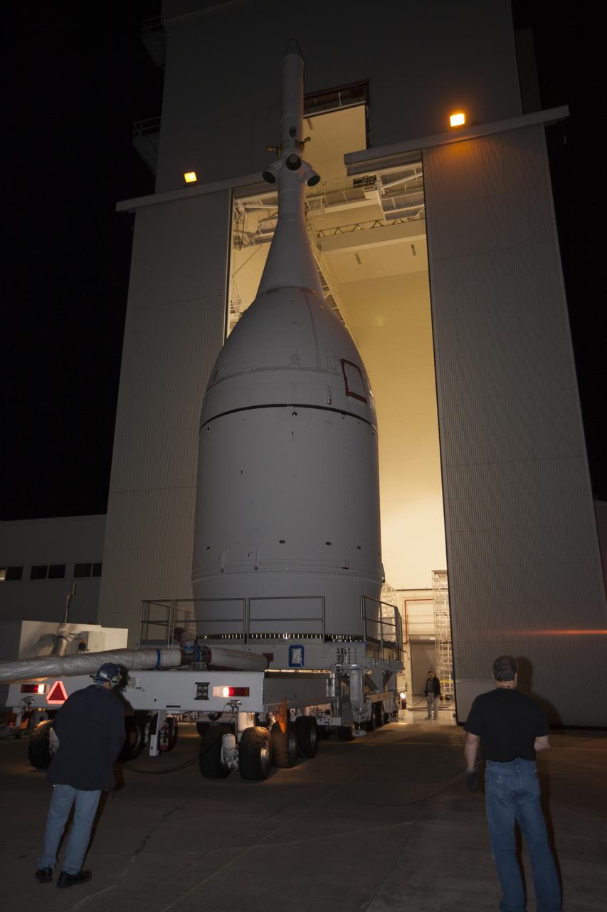 At NASA's Kennedy Space Center in Florida, the agency's completed Orion spacecraft begins its trip from the Launch Abort System Facility to Launch Complex 37 at Cape Canaveral Air Force Station. After arrival at the launch pad, United Launch Alliance engineers and technicians will lift Orion and mount it atop its Delta IV Heavy rocket. Orion is the exploration spacecraft designed to carry astronauts to destinations not yet explored by humans, including an asteroid and Mars. It will have emergency abort capability, sustain the crew during space travel and provide safe re-entry from deep space return velocities. The first unpiloted flight test of Orion is scheduled to launch Dec. 4, 2014 atop a United Launch Alliance Delta IV Heavy rocket, and in 2018 on NASA’s Space Launch System rocket.