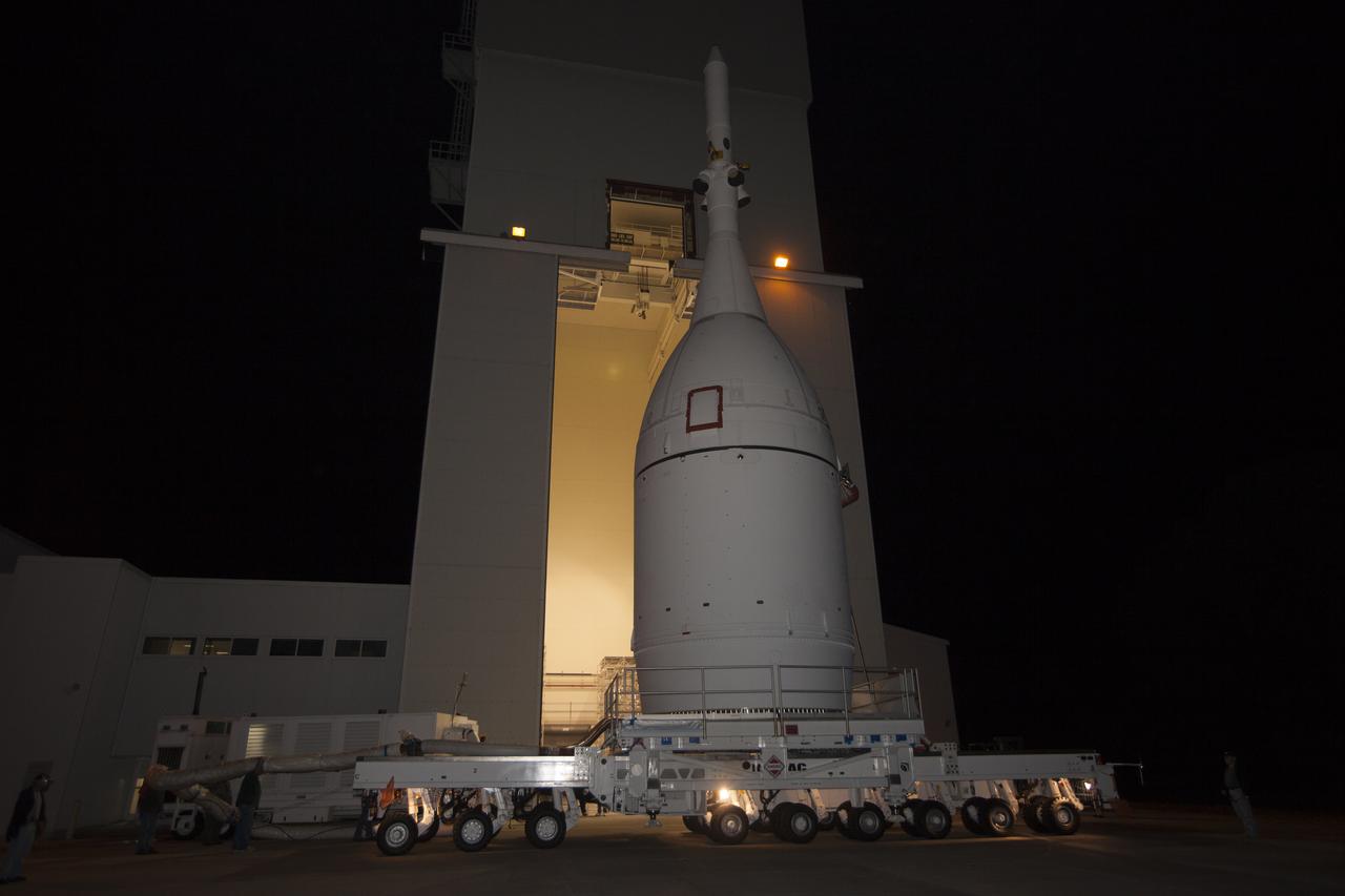 At NASA's Kennedy Space Center in Florida, the agency's completed Orion spacecraft begins its trip from the Launch Abort System Facility to Launch Complex 37 at Cape Canaveral Air Force Station. After arrival at the launch pad, United Launch Alliance engineers and technicians will lift Orion and mount it atop its Delta IV Heavy rocket. Orion is the exploration spacecraft designed to carry astronauts to destinations not yet explored by humans, including an asteroid and Mars. It will have emergency abort capability, sustain the crew during space travel and provide safe re-entry from deep space return velocities. The first unpiloted flight test of Orion is scheduled to launch Dec. 4, 2014 atop a United Launch Alliance Delta IV Heavy rocket, and in 2018 on NASA’s Space Launch System rocket.