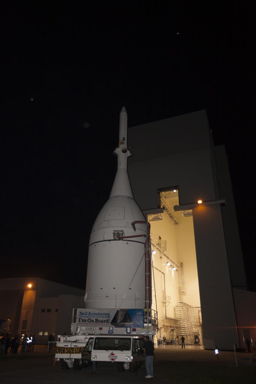 At NASA's Kennedy Space Center in Florida, the agency's completed Orion spacecraft begins its trip from the Launch Abort System Facility to Launch Complex 37 at Cape Canaveral Air Force Station. Orion spent many months in Kennedy's Neil Armstrong Operations and Checkout Building undergoing final assembly. Hundreds of employees who work there signed the banner that states, "I'm On Board!" In doing so, their signature indicated they did their part to ensure mission success. After arrival at the launch pad, United Launch Alliance engineers and technicians will lift Orion and mount it atop its Delta IV Heavy rocket. Orion is the exploration spacecraft designed to carry astronauts to destinations not yet explored by humans, including an asteroid and Mars. It will have emergency abort capability, sustain the crew during space travel and provide safe re-entry from deep space return velocities. The first unpiloted flight test of Orion is scheduled to launch Dec. 4, 2014 atop a United Launch Alliance Delta IV Heavy rocket, and in 2018 on NASA’s Space Launch System rocket.