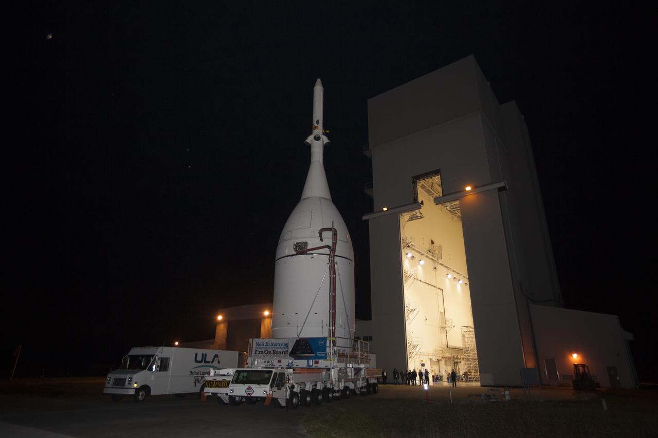 At NASA's Kennedy Space Center in Florida, the agency's completed Orion spacecraft begins its trip from the Launch Abort System Facility to Launch Complex 37 at Cape Canaveral Air Force Station. Orion spent many months in Kennedy's Neil Armstrong Operations and Checkout Building undergoing final assembly. Hundreds of employees who work there signed the banner that states, "I'm On Board!" In doing so, their signature indicated they did their part to ensure mission success. After arrival at the launch pad, United Launch Alliance engineers and technicians will lift Orion and mount it atop its Delta IV Heavy rocket. Orion is the exploration spacecraft designed to carry astronauts to destinations not yet explored by humans, including an asteroid and Mars. It will have emergency abort capability, sustain the crew during space travel and provide safe re-entry from deep space return velocities. The first unpiloted flight test of Orion is scheduled to launch Dec. 4, 2014 atop a United Launch Alliance Delta IV Heavy rocket, and in 2018 on NASA’s Space Launch System rocket.