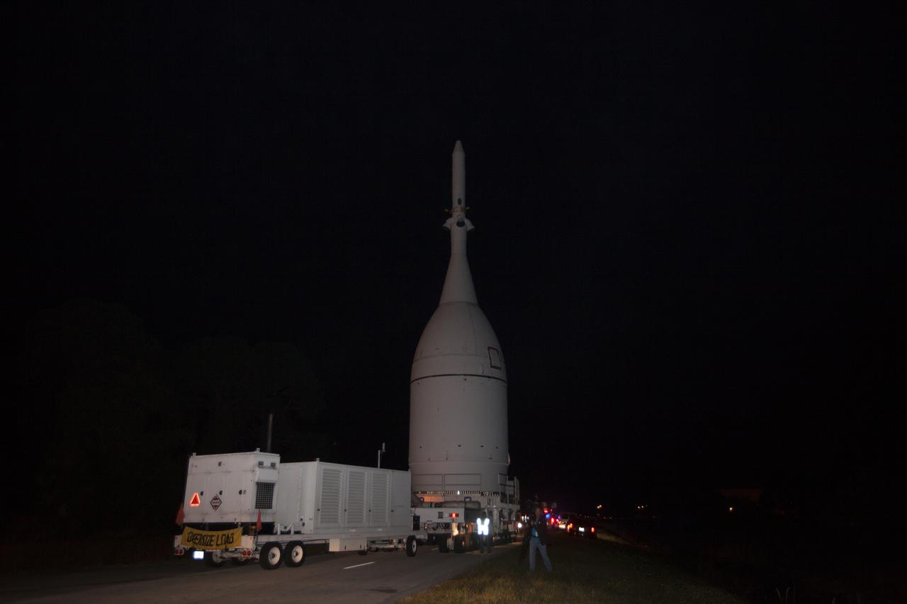 At NASA's Kennedy Space Center in Florida, the agency's completed Orion spacecraft begins its trip from the Launch Abort System Facility to Launch Complex 37 at Cape Canaveral Air Force Station. After arrival at the launch pad, United Launch Alliance engineers and technicians will lift Orion and mount it atop its Delta IV Heavy rocket. Orion is the exploration spacecraft designed to carry astronauts to destinations not yet explored by humans, including an asteroid and Mars. It will have emergency abort capability, sustain the crew during space travel and provide safe re-entry from deep space return velocities. The first unpiloted flight test of Orion is scheduled to launch Dec. 4, 2014 atop a United Launch Alliance Delta IV Heavy rocket, and in 2018 on NASA’s Space Launch System rocket.