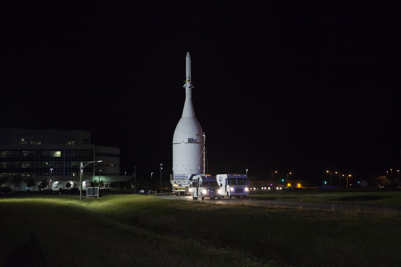 At NASA's Kennedy Space Center in Florida, the agency's Orion is transported to Launch Complex 37 at Cape Canaveral Air Force Station. After arrival at the launch pad, United Launch Alliance engineers and technicians will lift Orion and mount it atop its Delta IV Heavy rocket. Orion is the exploration spacecraft designed to carry astronauts to destinations not yet explored by humans, including an asteroid and Mars. It will have emergency abort capability, sustain the crew during space travel and provide safe re-entry from deep space return velocities. The first unpiloted flight test of Orion is scheduled to launch Dec. 4, 2014 atop a United Launch Alliance Delta IV Heavy rocket, and in 2018 on NASA’s Space Launch System rocket.