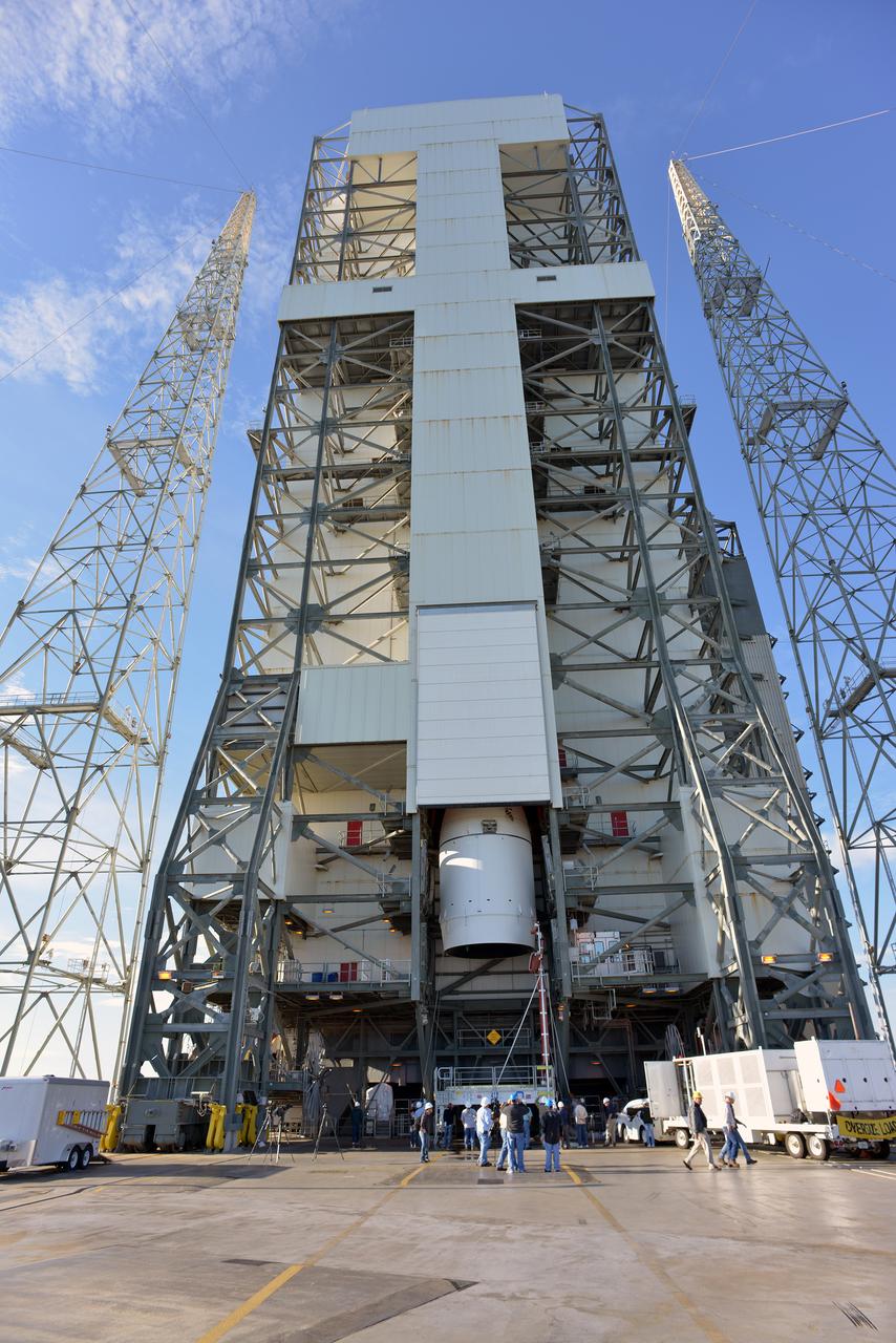 At Cape Canaveral Air Force Station's Launch Complex 37, United Launch Alliance engineers and technicians begin lifting the agency's Orion spacecraft for mounting atop its Delta IV Heavy rocket. Orion is the exploration spacecraft designed to carry astronauts to destinations not yet explored by humans, including an asteroid and Mars. It will have emergency abort capability, sustain the crew during space travel and provide safe re-entry from deep space return velocities. The first unpiloted flight test of Orion is scheduled to launch Dec. 4, 2014 atop a United Launch Alliance Delta IV Heavy rocket, and in 2018 on NASA’s Space Launch System rocket.
