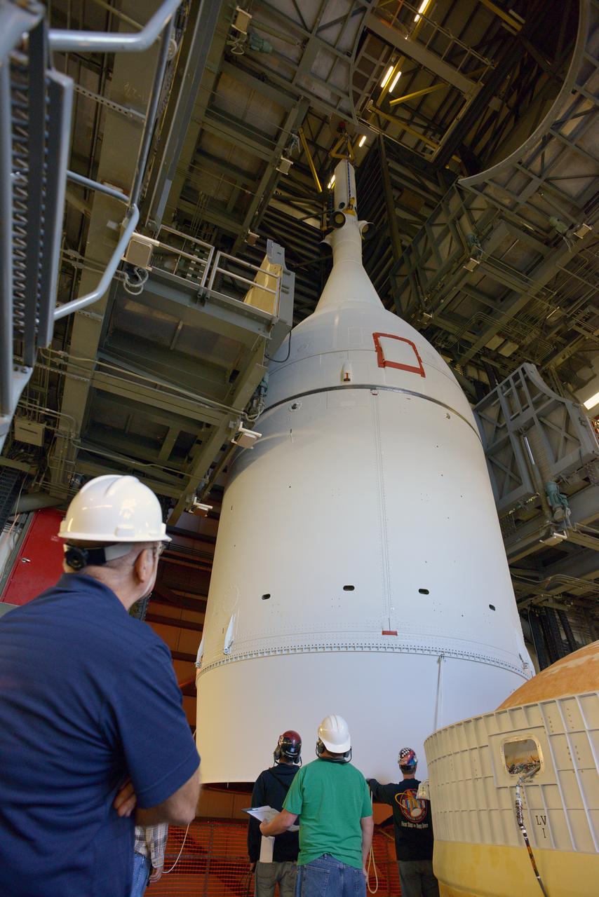 At Cape Canaveral Air Force Station's Launch Complex 37, United Launch Alliance engineers and technicians prepare to mate the agency's Orion spacecraft to its Delta IV Heavy rocket. Orion is the exploration spacecraft designed to carry astronauts to destinations not yet explored by humans, including an asteroid and Mars. It will have emergency abort capability, sustain the crew during space travel and provide safe re-entry from deep space return velocities. The first unpiloted flight test of Orion is scheduled to launch Dec. 4, 2014 atop a United Launch Alliance Delta IV Heavy rocket, and in 2018 on NASA’s Space Launch System rocket.