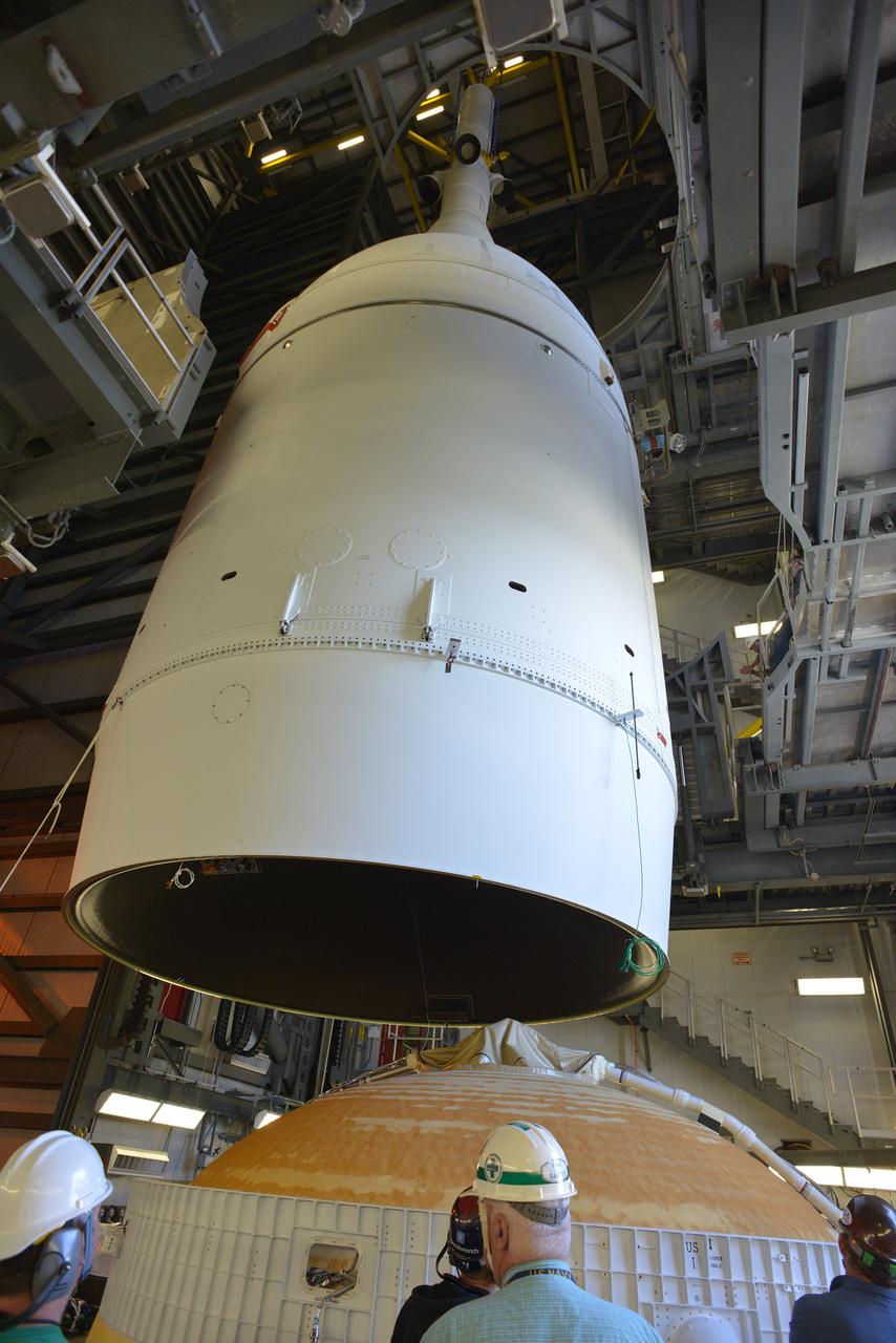 At Cape Canaveral Air Force Station's Launch Complex 37, United Launch Alliance engineers and technicians mate the agency's Orion spacecraft to its Delta IV Heavy rocket. Orion is the exploration spacecraft designed to carry astronauts to destinations not yet explored by humans, including an asteroid and Mars. It will have emergency abort capability, sustain the crew during space travel and provide safe re-entry from deep space return velocities. The first unpiloted flight test of Orion is scheduled to launch Dec. 4, 2014 atop a United Launch Alliance Delta IV Heavy rocket, and in 2018 on NASA’s Space Launch System rocket. 