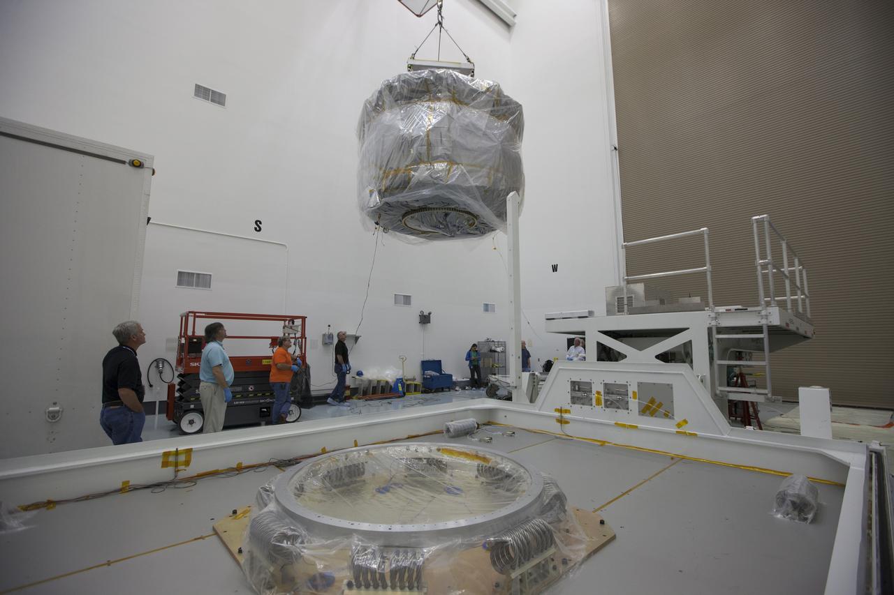 Two Magnetospheric Multiscale, or MMS, spacecraft comprising the mission’s upper stack are lifted from the transporter in Building 2 of the Astrotech payload processing facility in Titusville, Florida, near Kennedy Space Center. The two MMS spacecraft comprising the lower stack arrived at Astrotech on Oct. 29. The Magnetospheric Multiscale mission is a Solar Terrestrial Probes mission comprising four identically instrumented spacecraft that will use Earth’s magnetosphere as a laboratory to study the microphysics of three fundamental plasma processes: magnetic reconnection, energetic particle acceleration and turbulence. Launch aboard a United Launch Alliance Atlas V rocket from Space Launch Complex 41 on Cape Canaveral Air Force Station is targeted for March 12, 2015. 